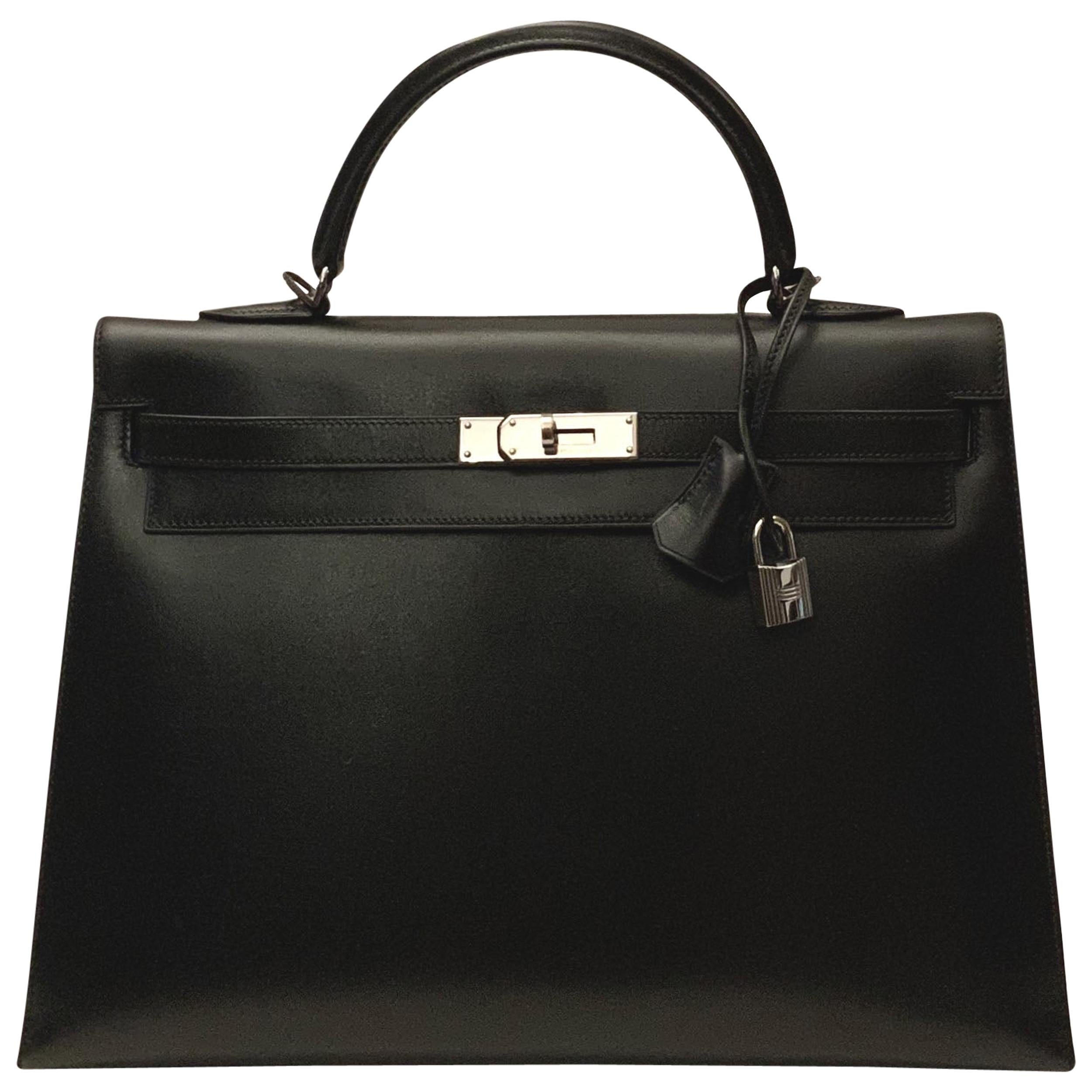 Kelly Sellier 35 in black box calfskin — the structured archive form