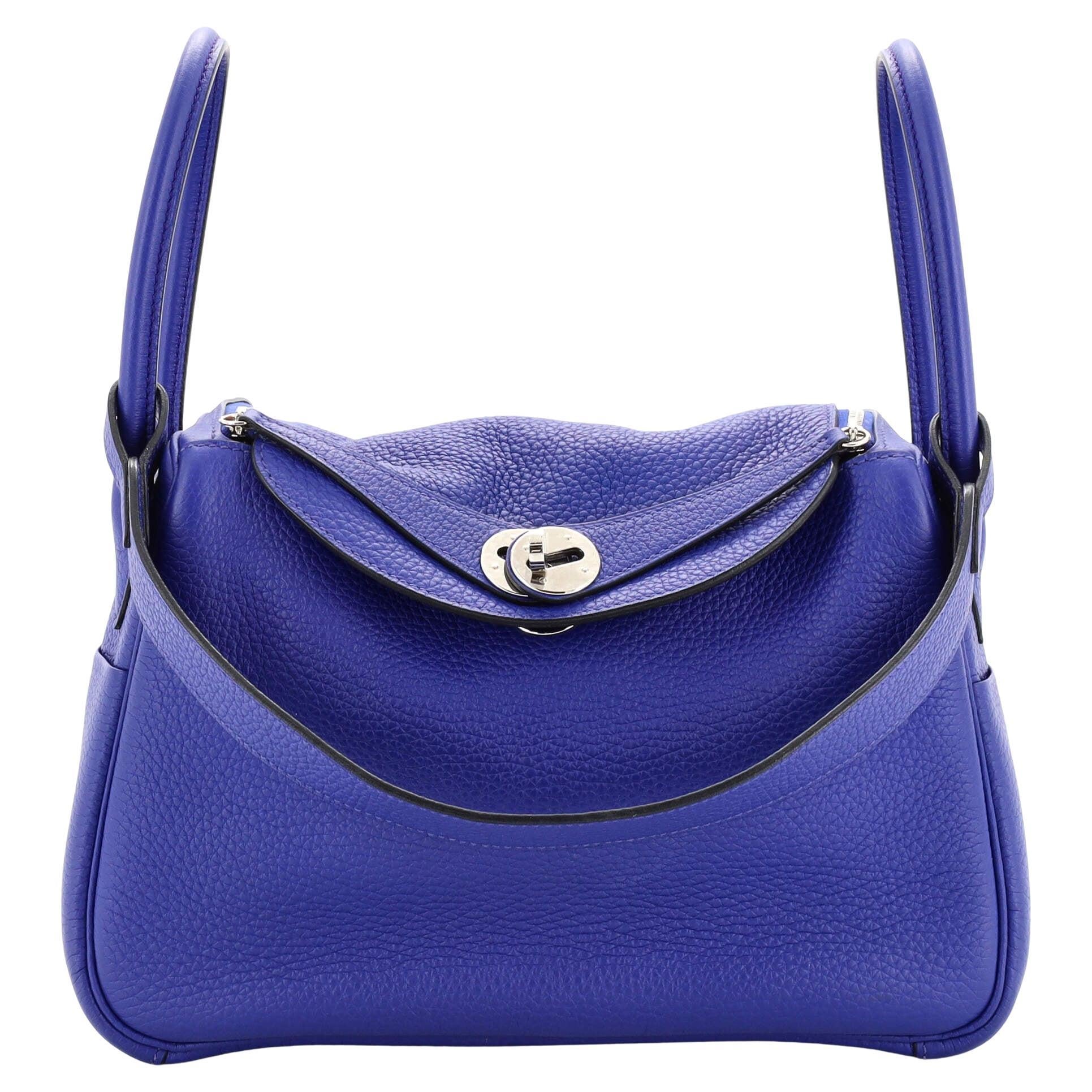 Blue Lindy front view showing the symmetrical zip openings