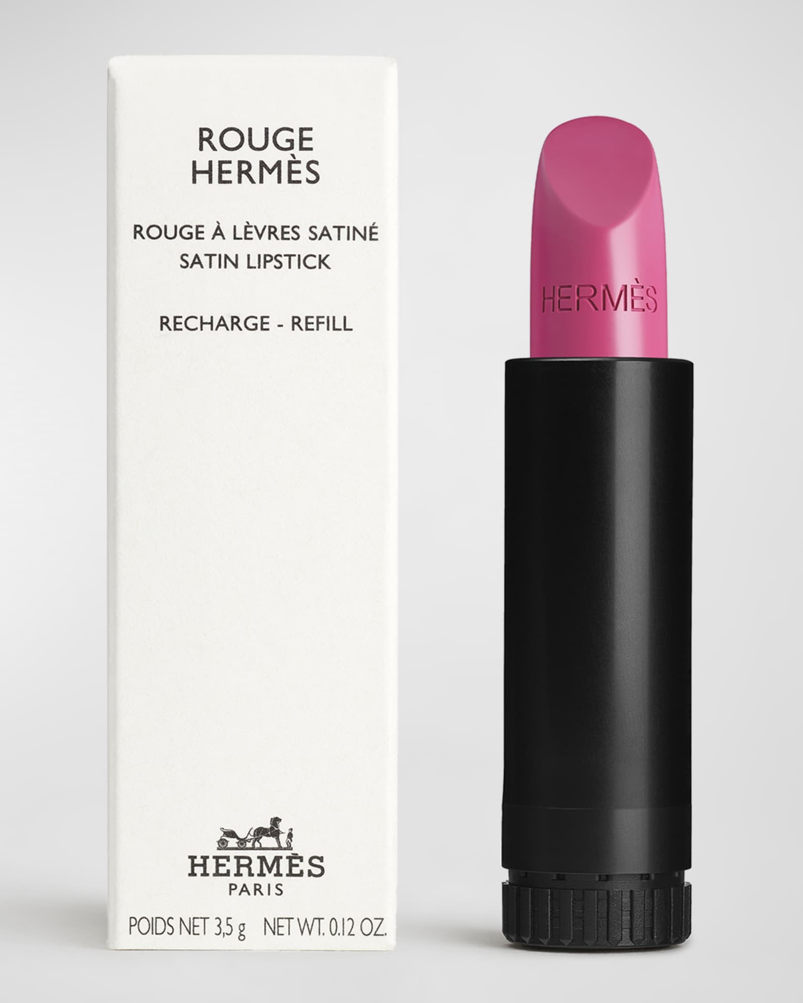 Pink satin refill bullet beside the white Rouge Hermès box
