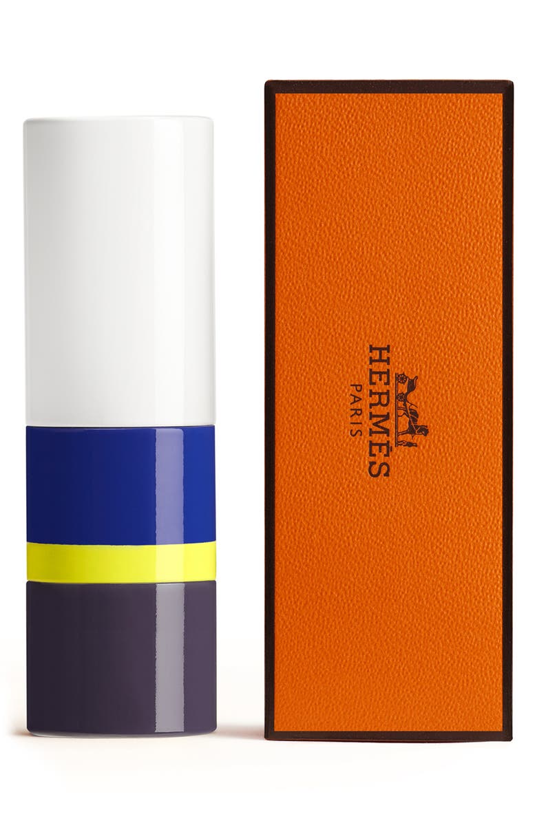 A blue-and-yellow colour-blocked lacquered case with the orange box