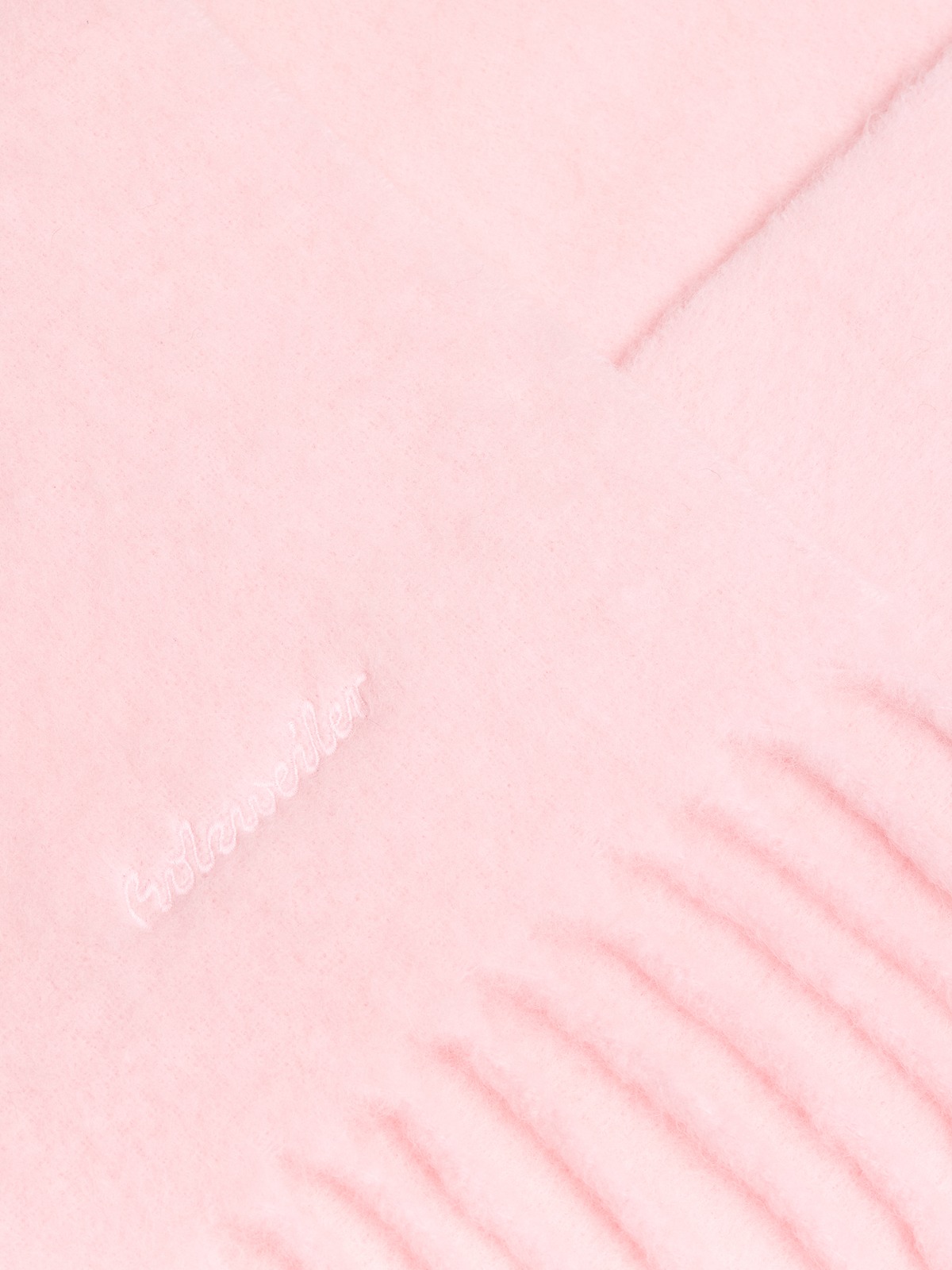 Fringe and brushed-fibre detail