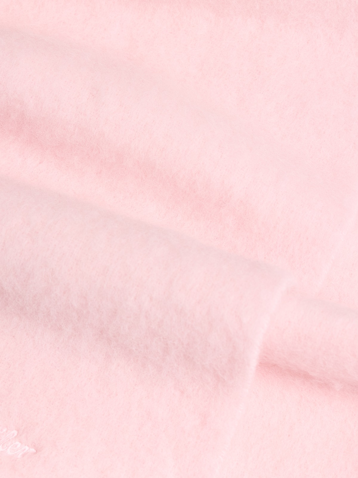Surface close-up showing the soft handle