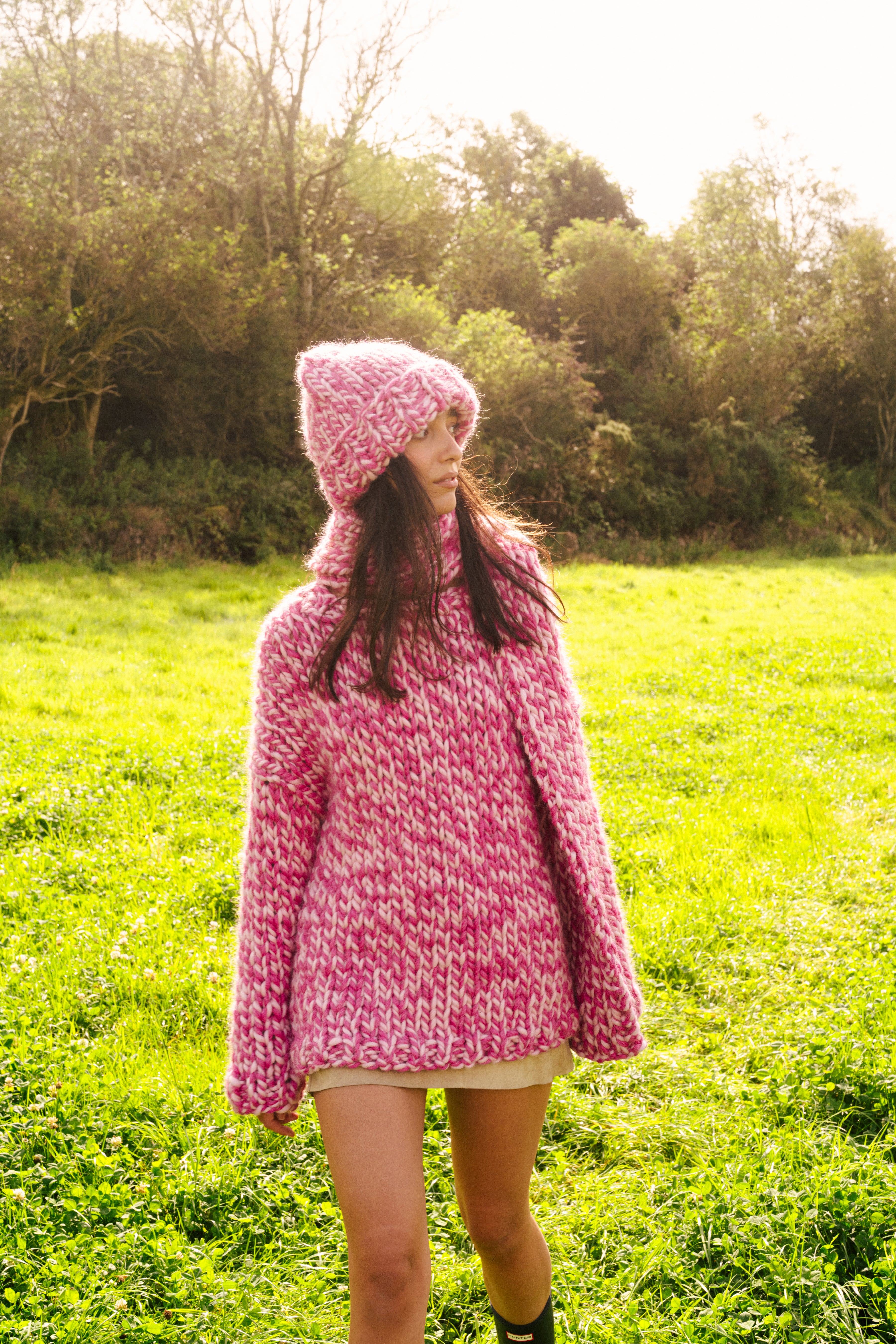 Profile view of the tall ribbed beanie shape