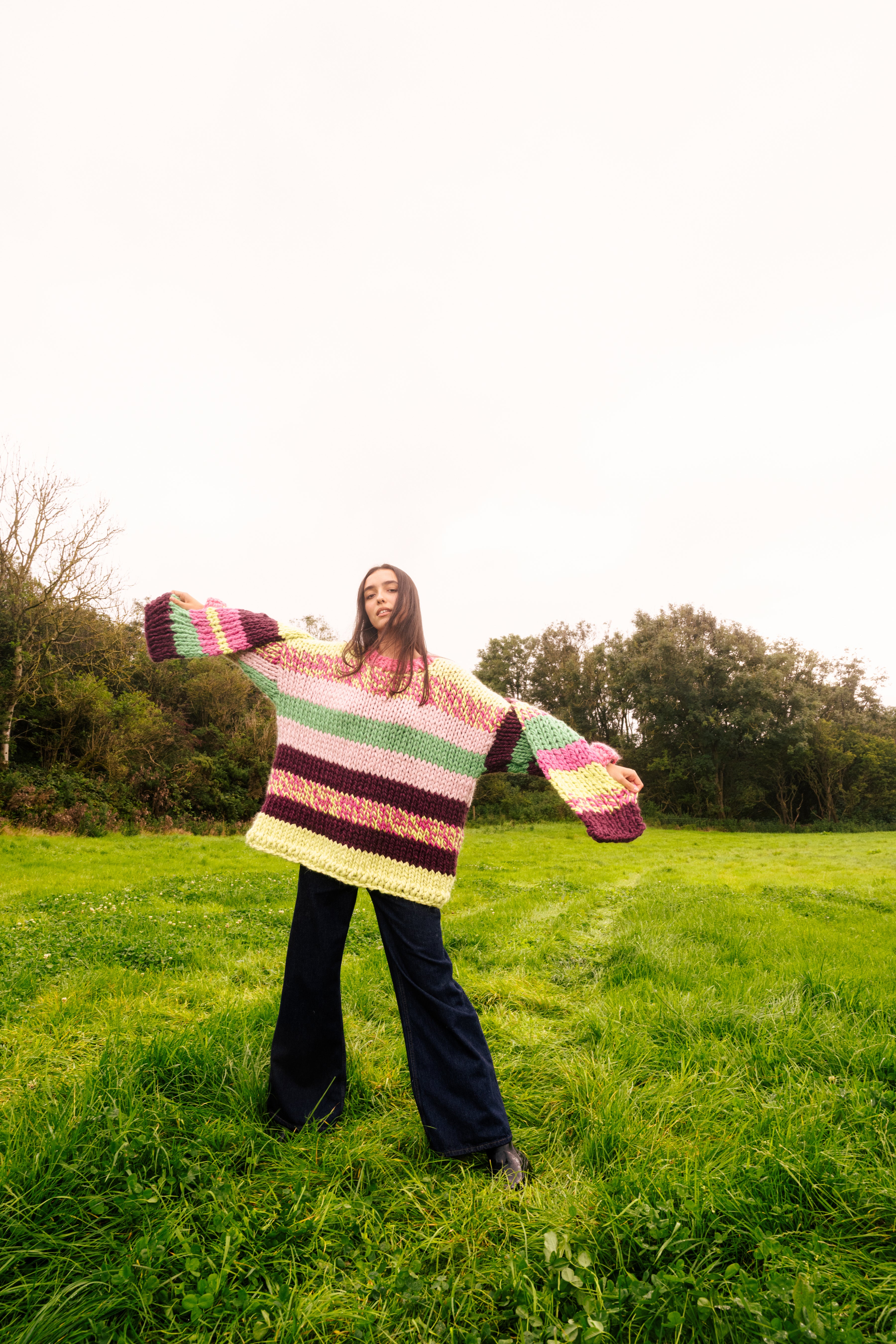 Full-length styling view with the scarf trailing down the front