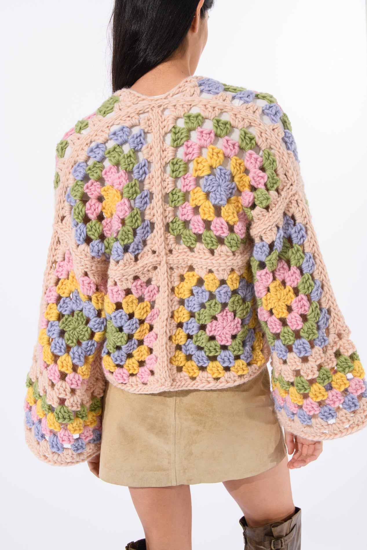 Back view showing the quilt-like crochet blocks