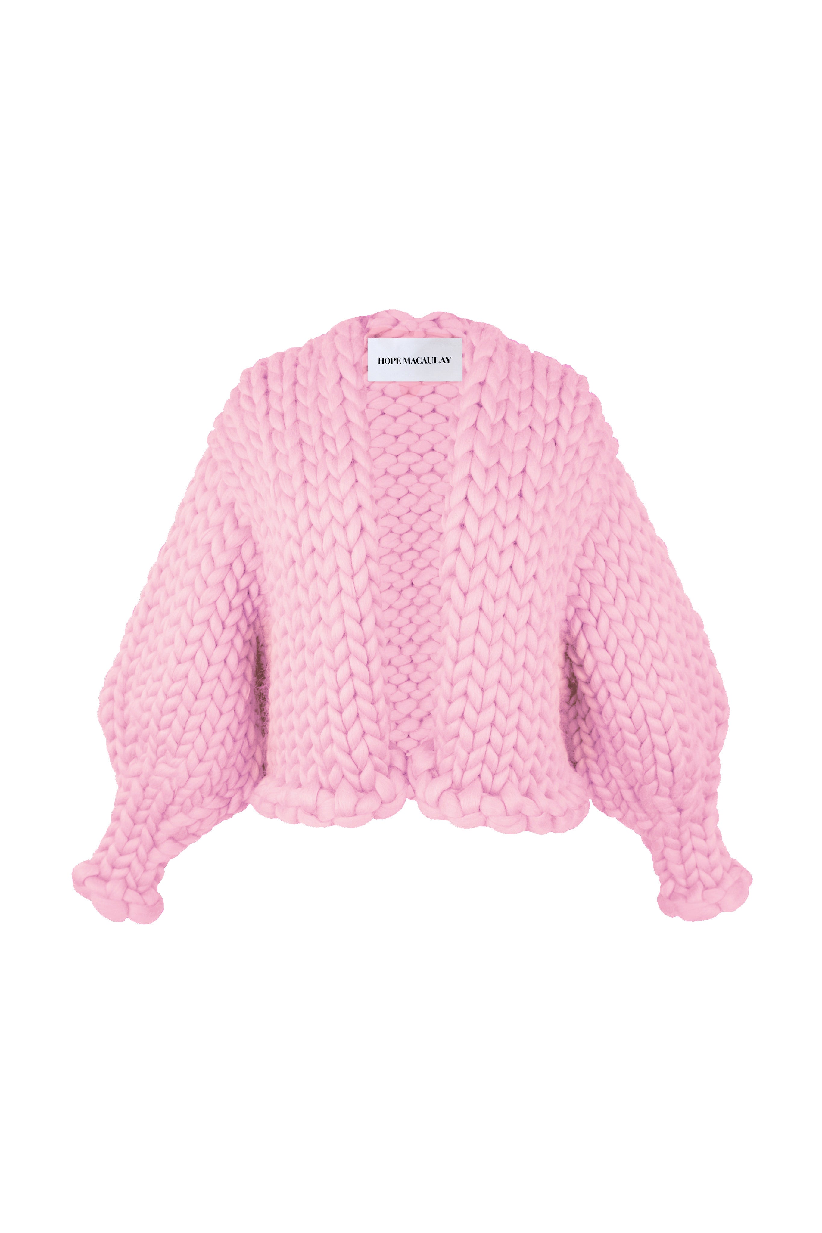 Side view showing the cardigan's boxy, slouchy volume