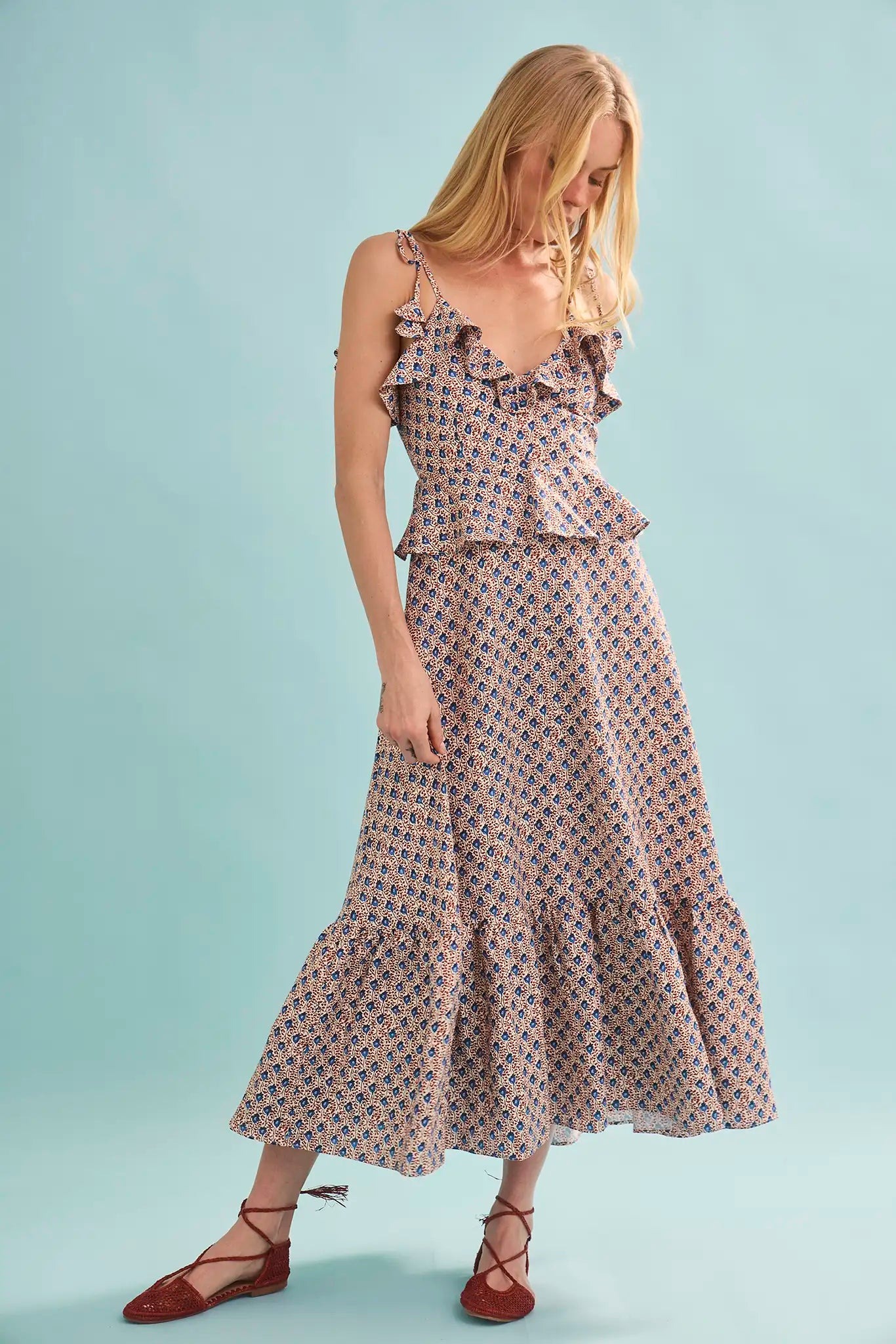 Studio angle highlighting the skirt drape