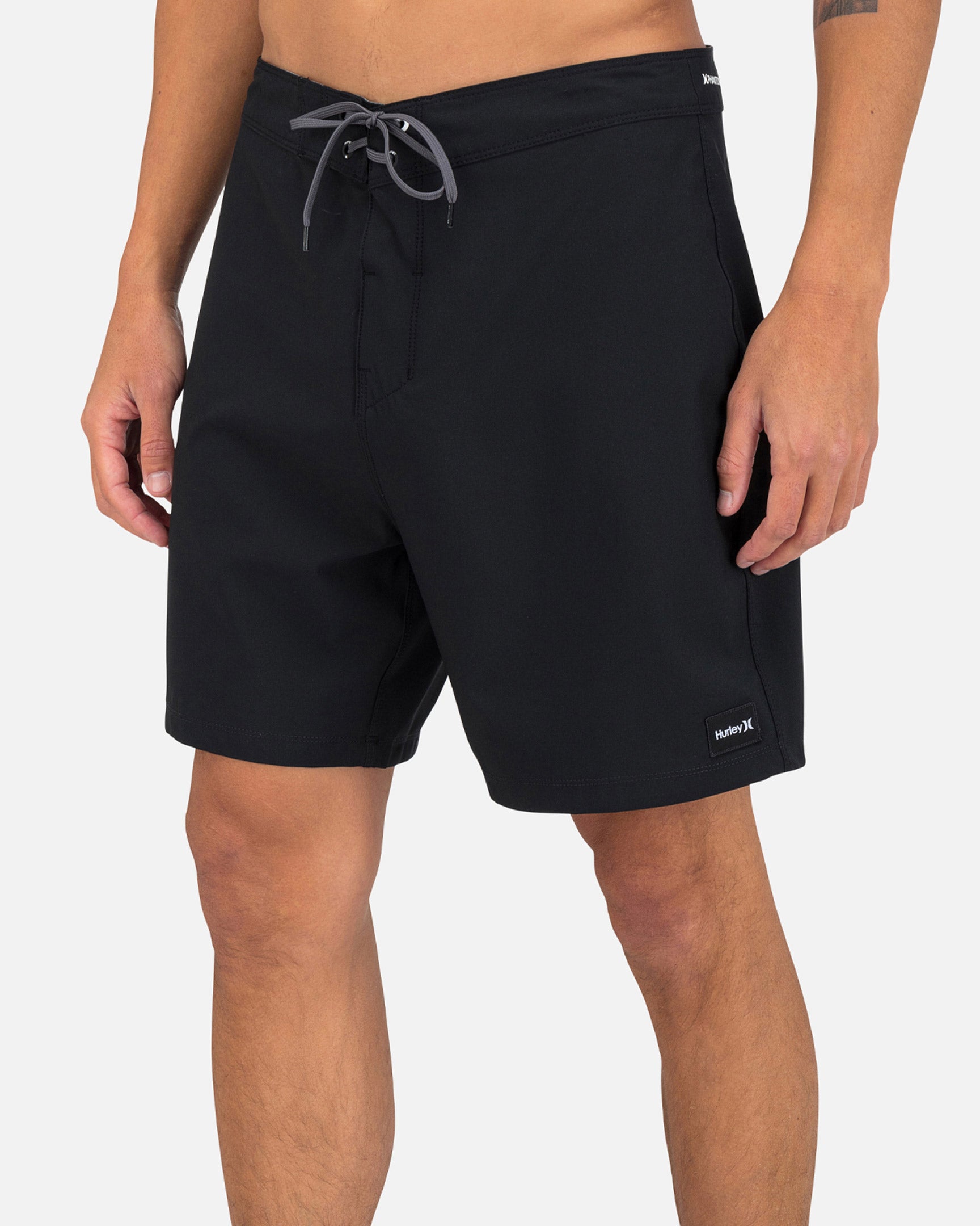 Close crop on the 18-inch straight-leg silhouette.
