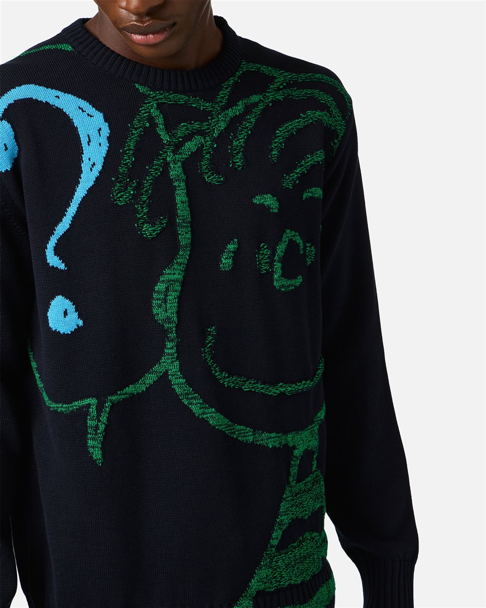 Three-quarter angle showing the sweater line