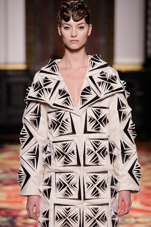 A latticed silhouette showing the collection's printed structure