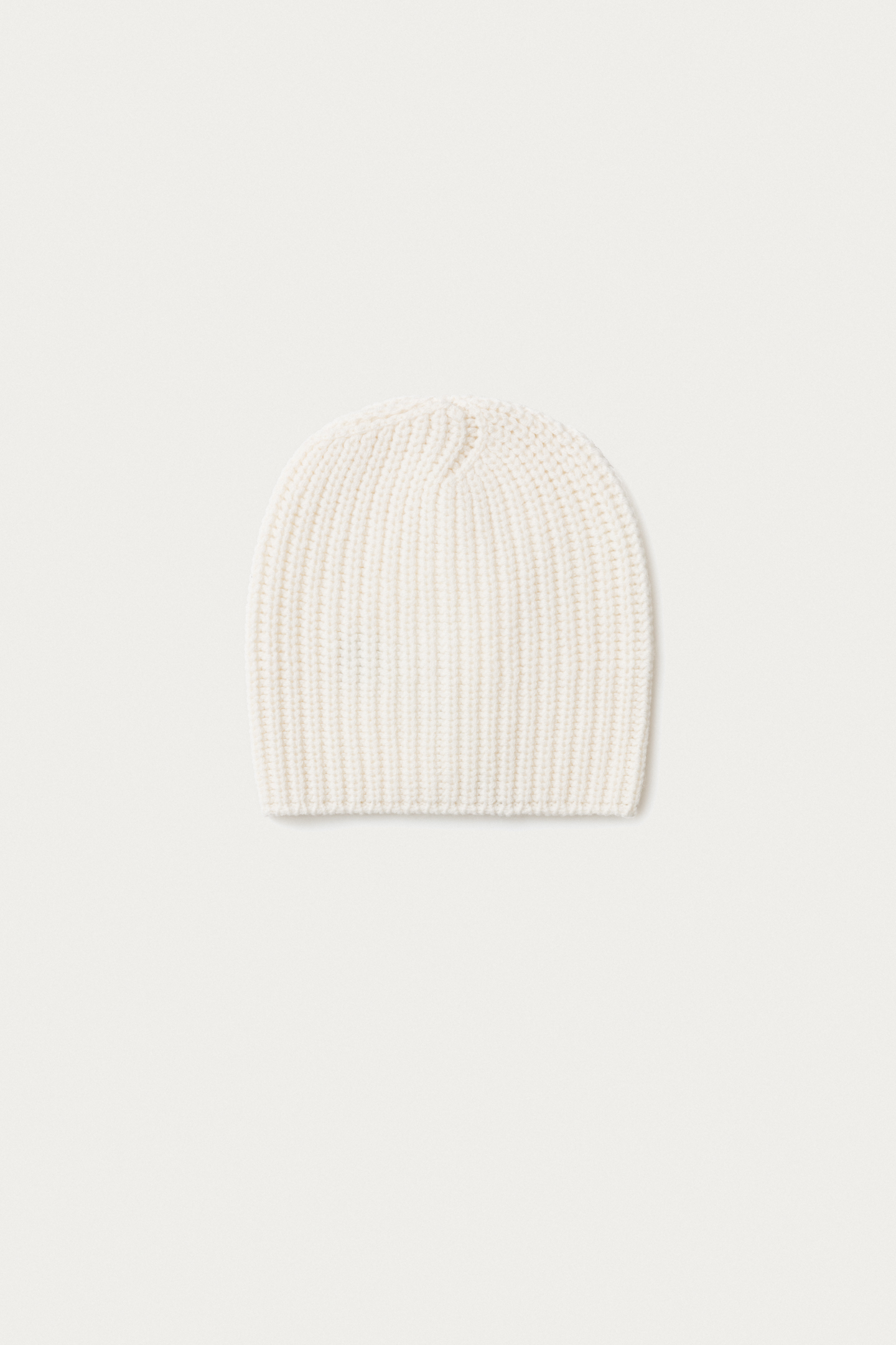 Ecru version showing the compact ribbed crown
