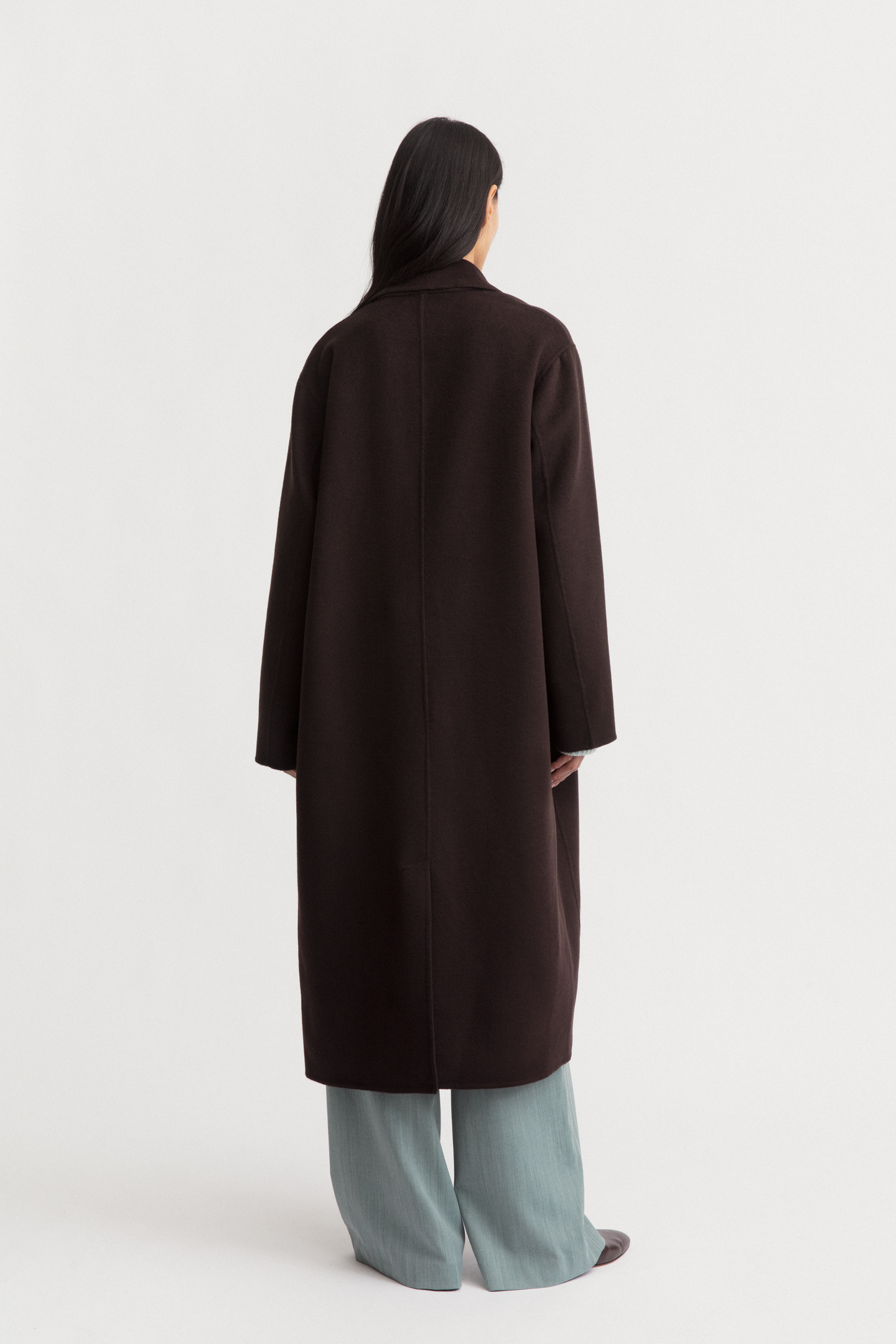 Rear view showing the back slit and straight silhouette