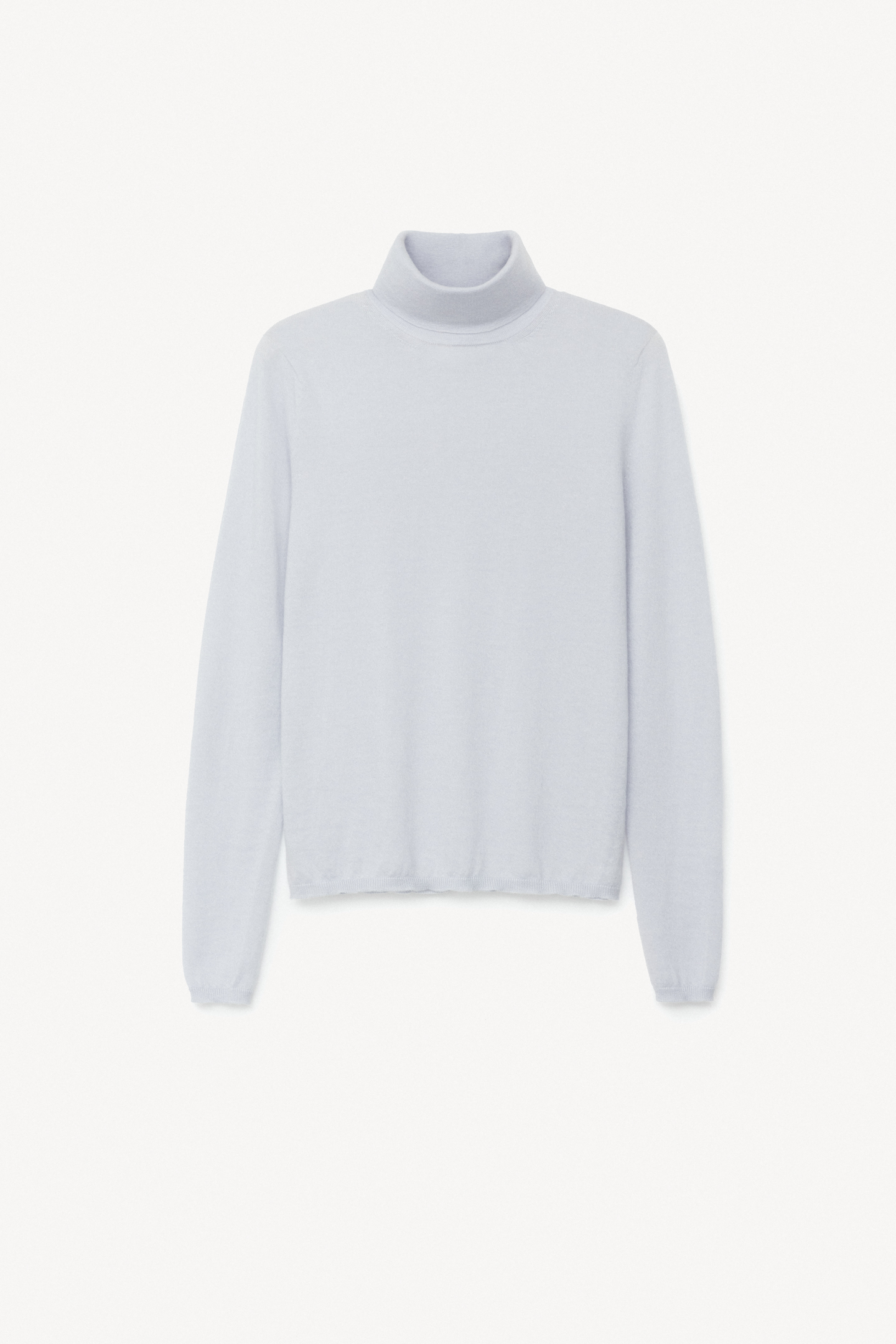 On-body shot showing the slim turtleneck frame
