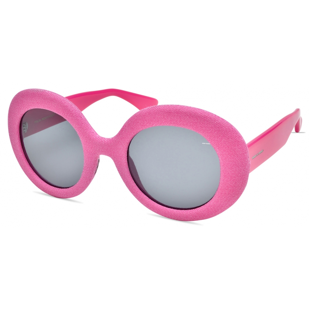 Pink colourway showing the same sculptural frame in a brighter register
