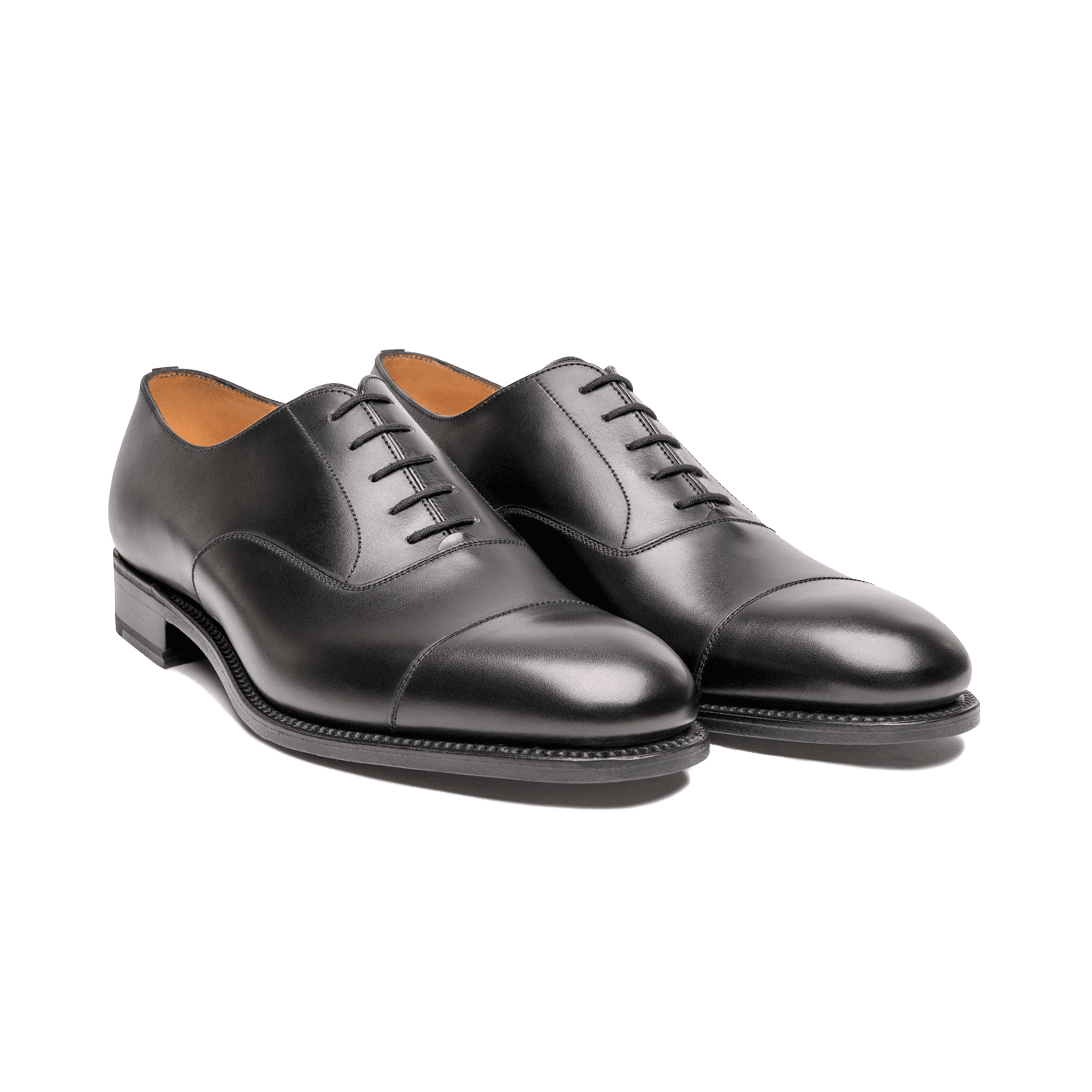 Black pair showing the formal closed-lacing stance