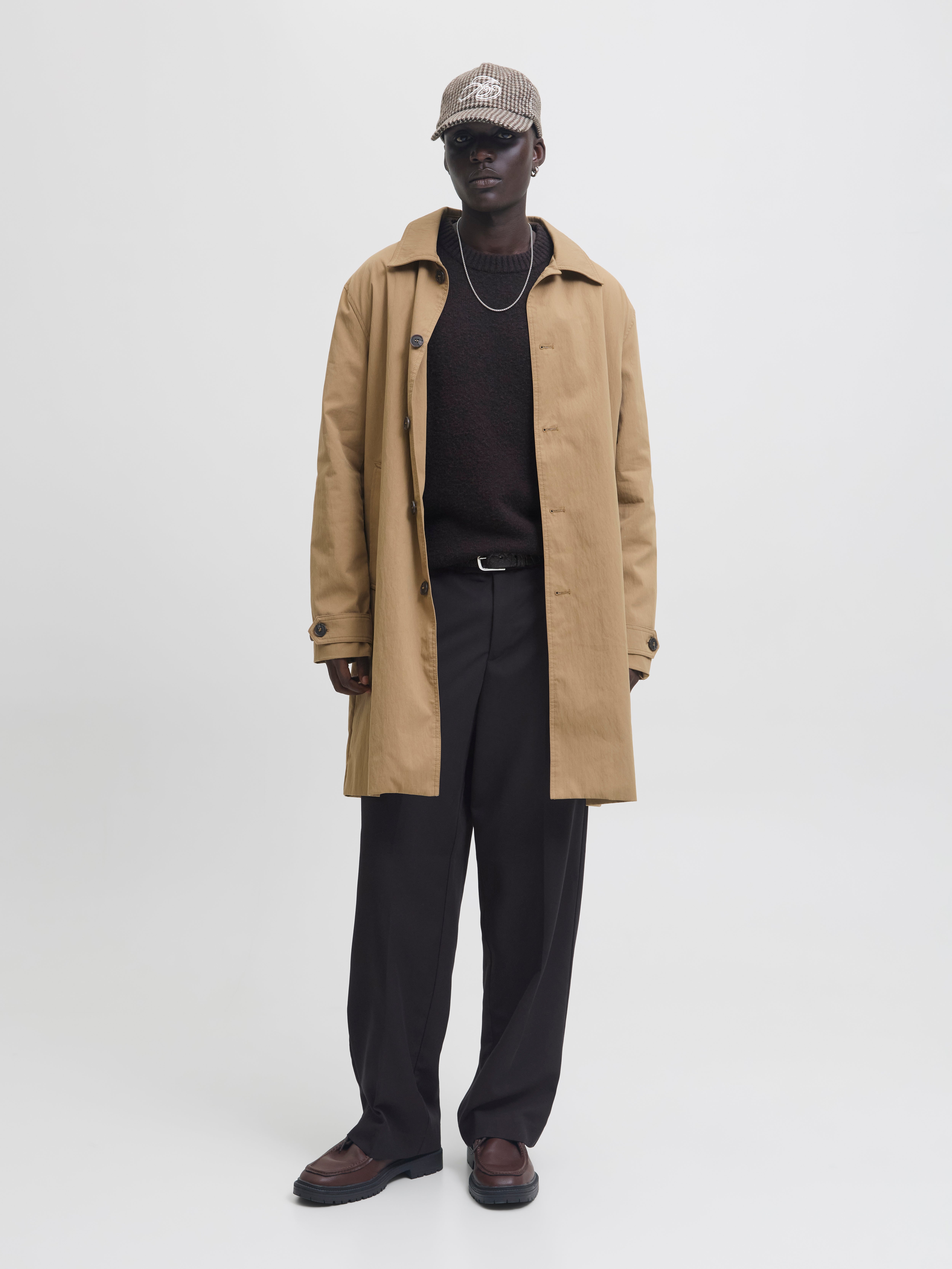 Styled with a coat and knit for a smart-casual look