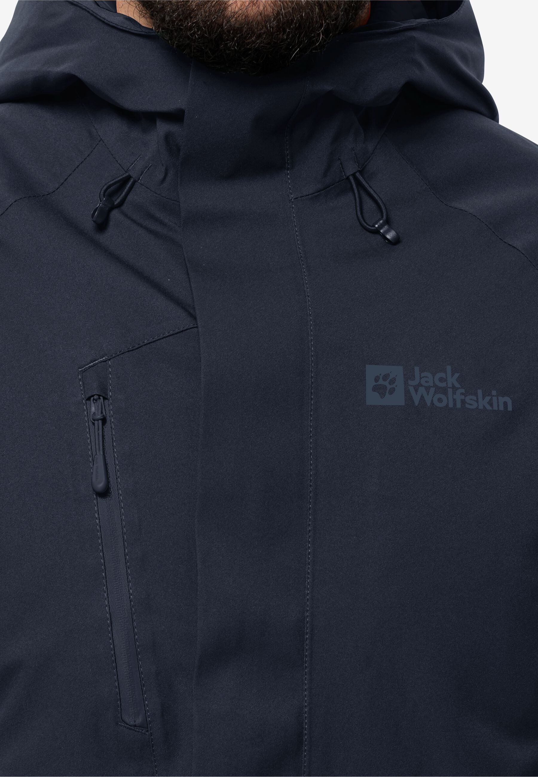 Chest panel and pocket close-up with tonal branding