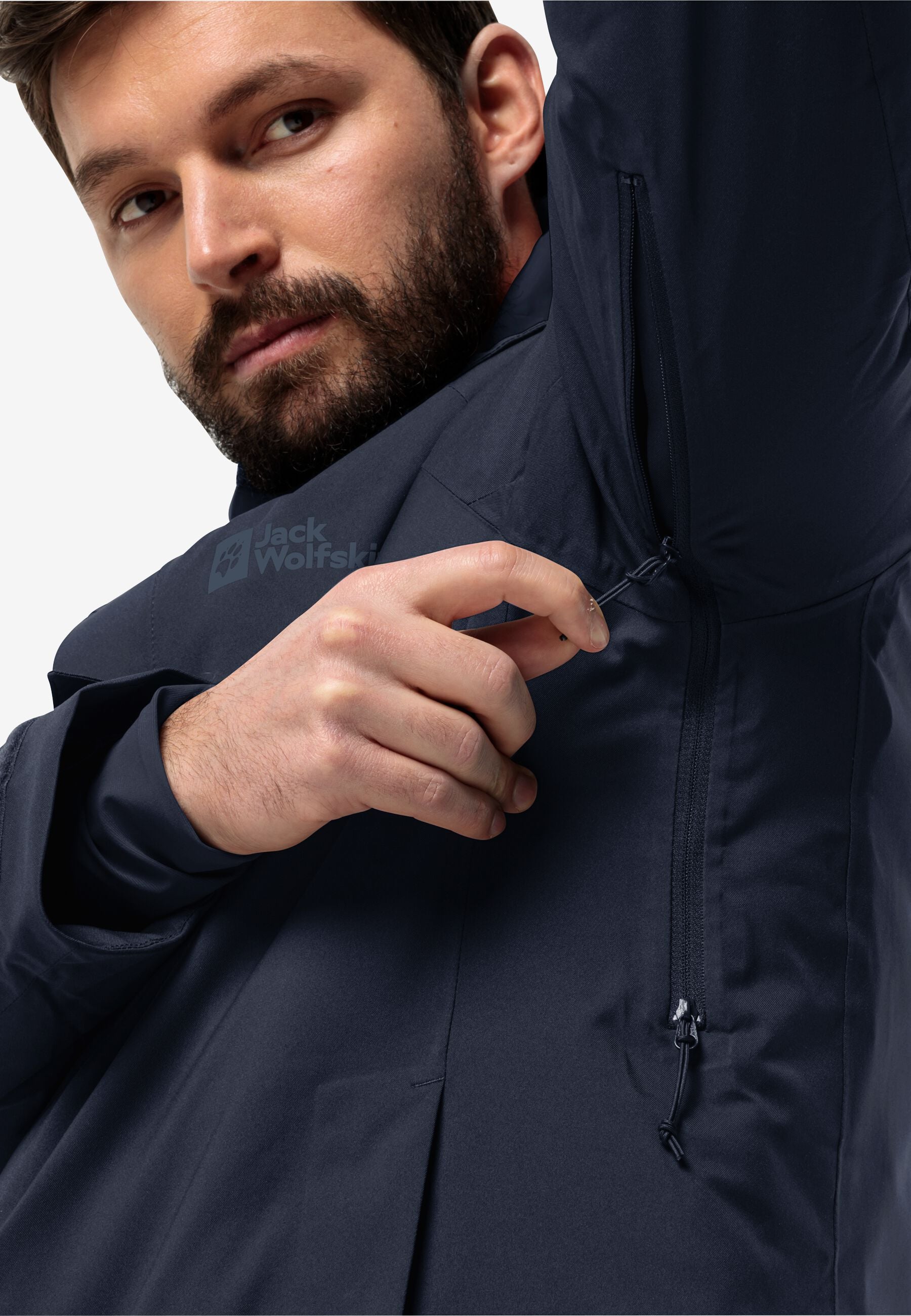 Underarm ventilation zip detail for cold-weather mobility