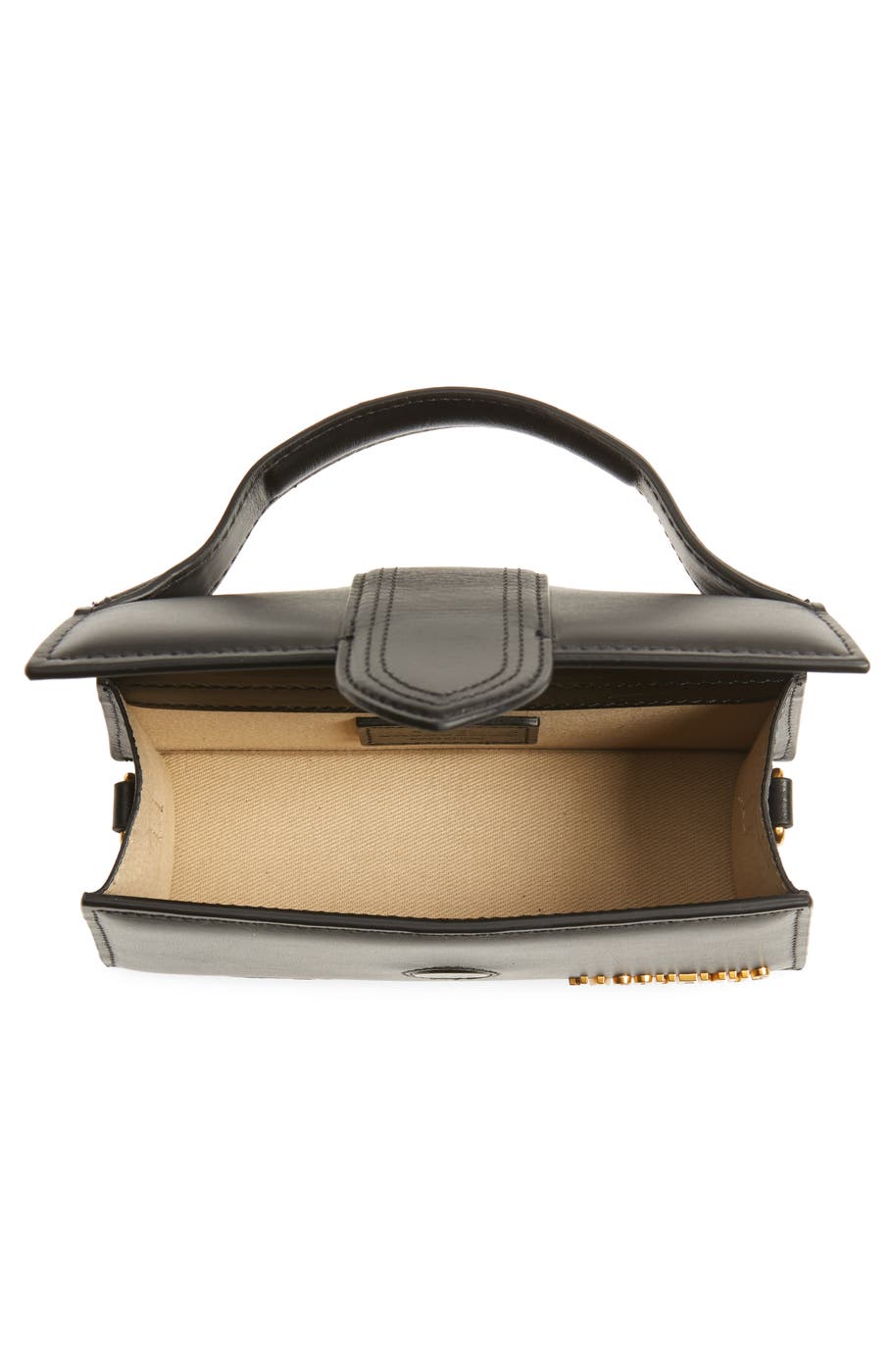 Interior open — the canvas-lined body and magnetic flap
