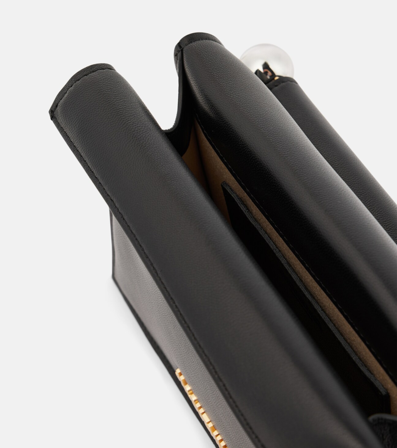 Detail of the leather grain and gold cube clasp