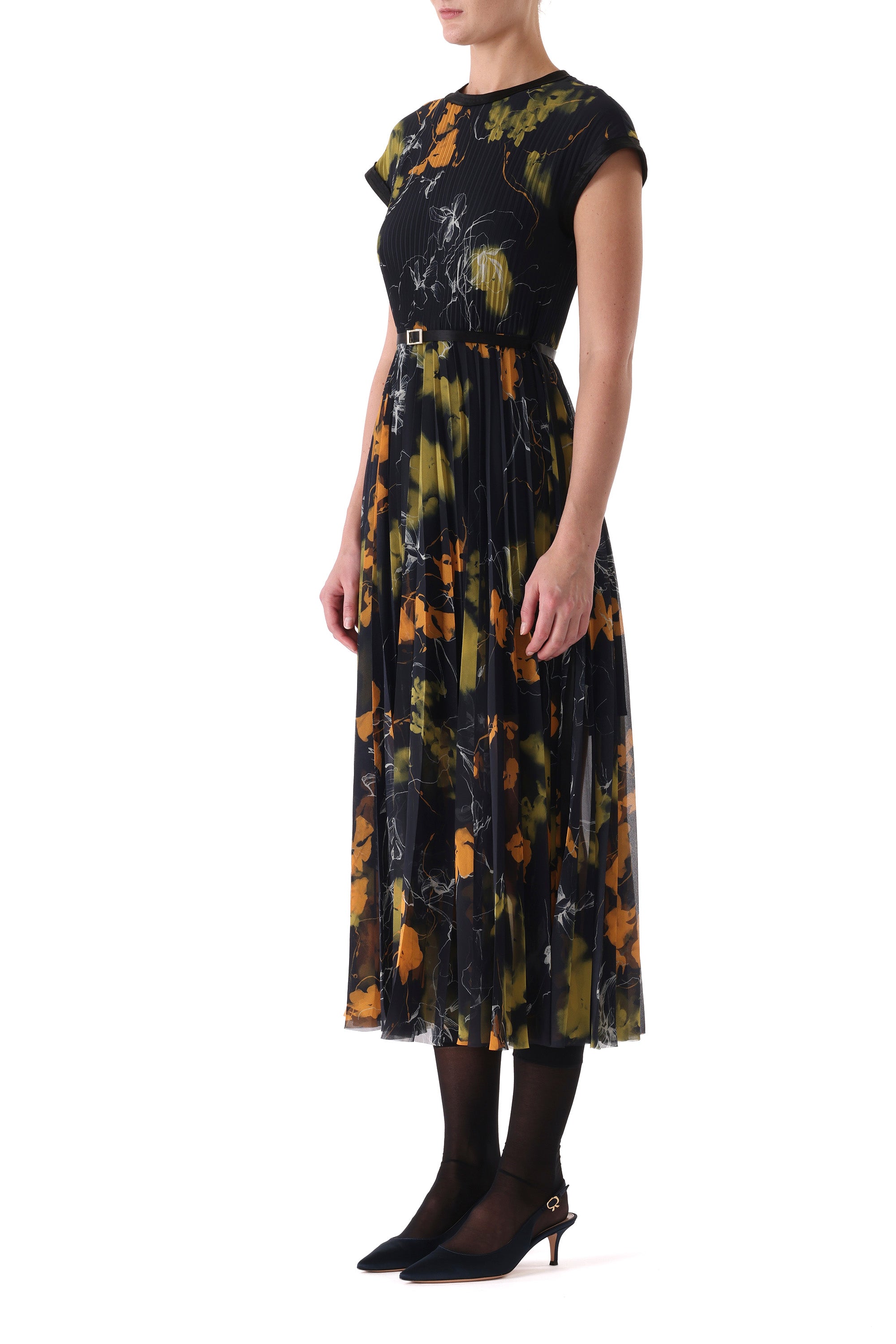Side angle showing the sweep of the pleats