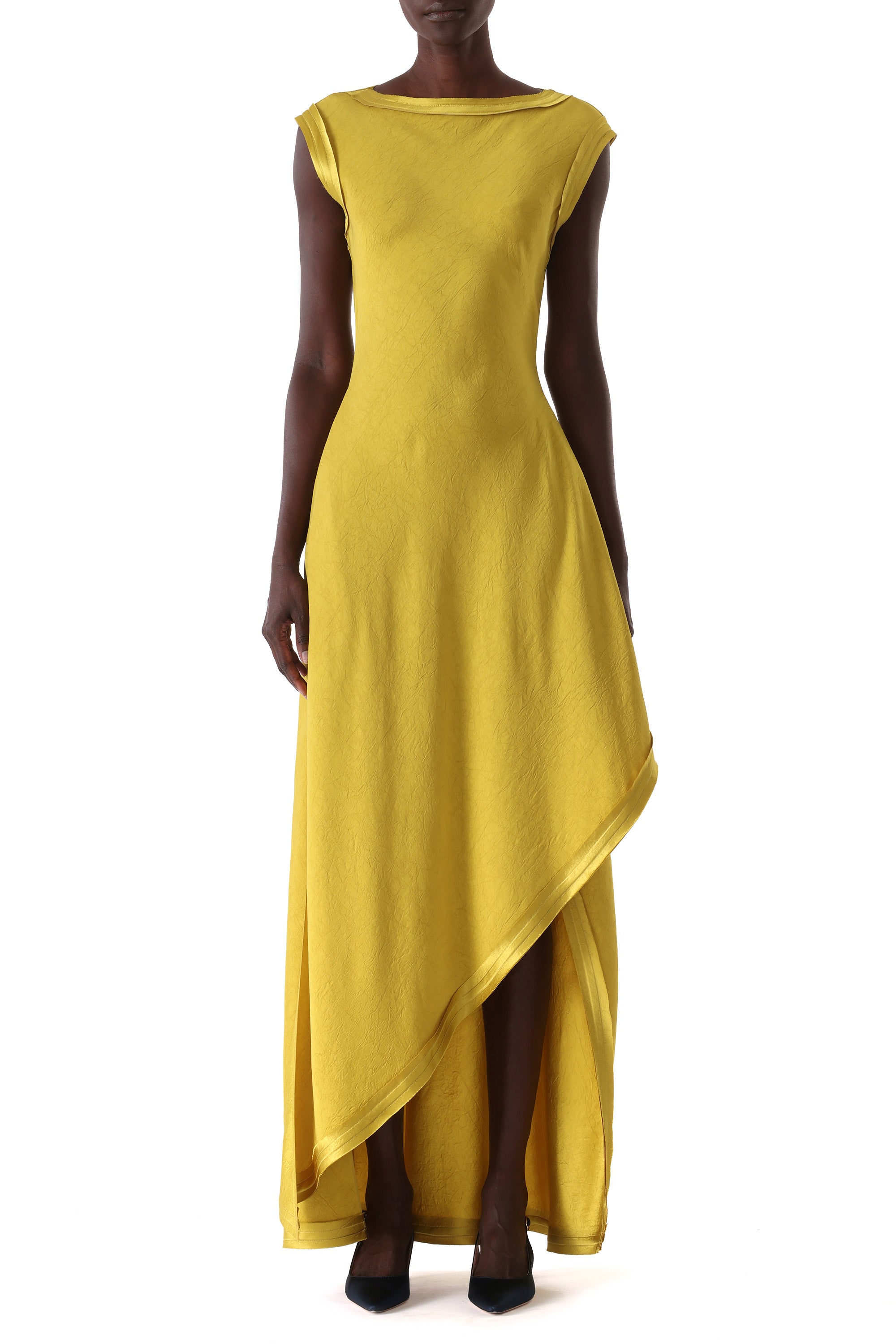 Front view with the soft neckline and sweeping hem
