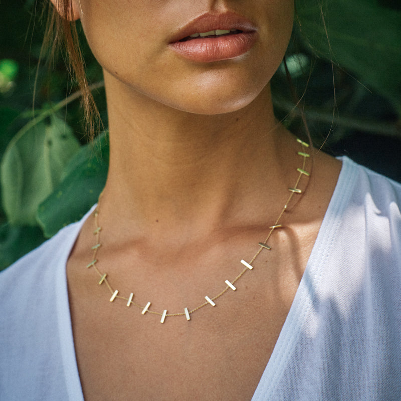Longer on-body styling with an open neckline