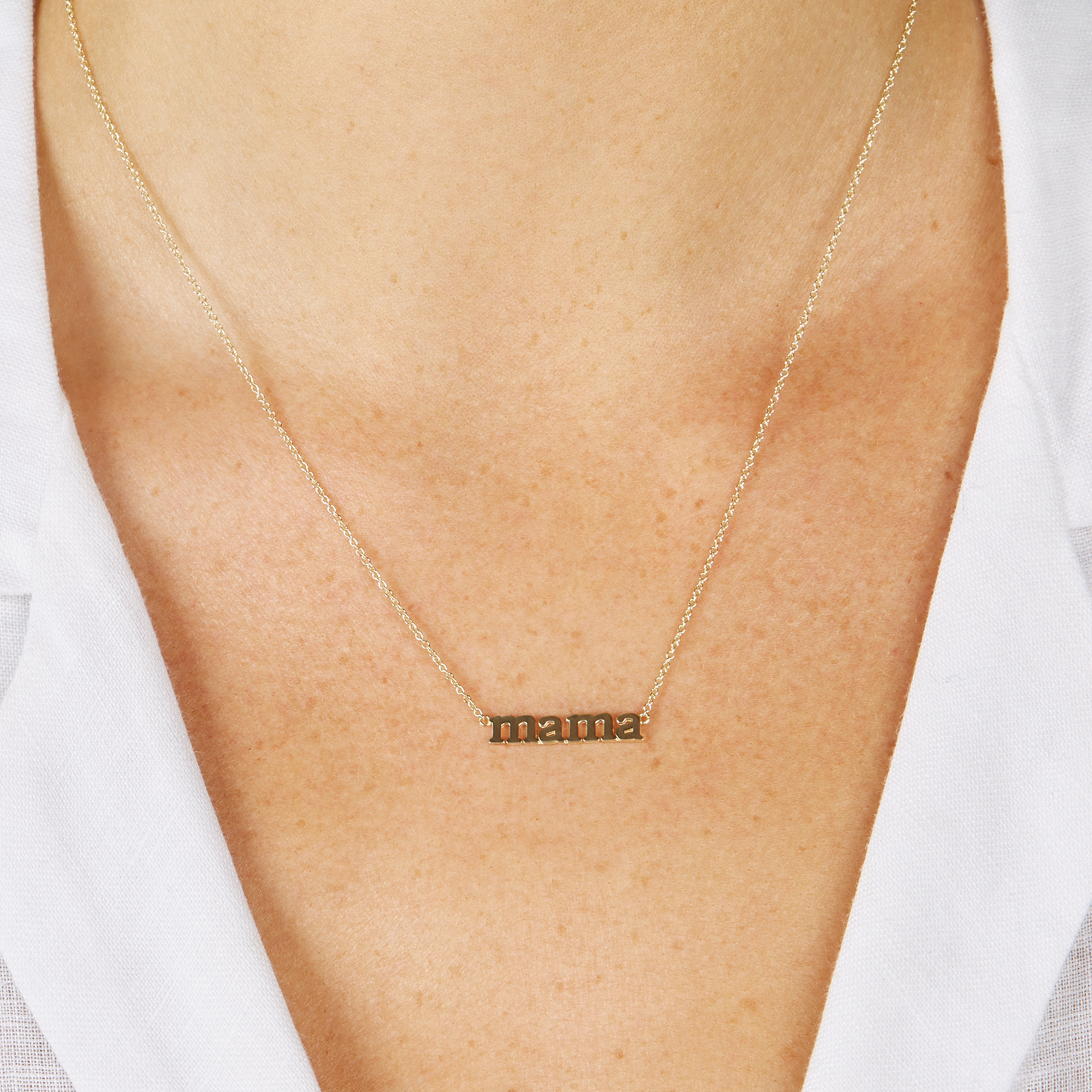Close neck shot showing how it layers with other chains