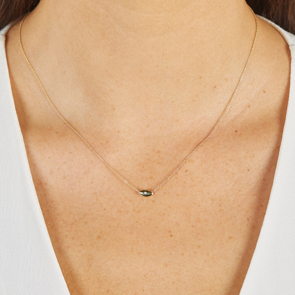 Alternate neck shot showing how small the charm reads