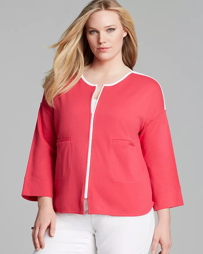 Coral plus-size interpretation edged in white