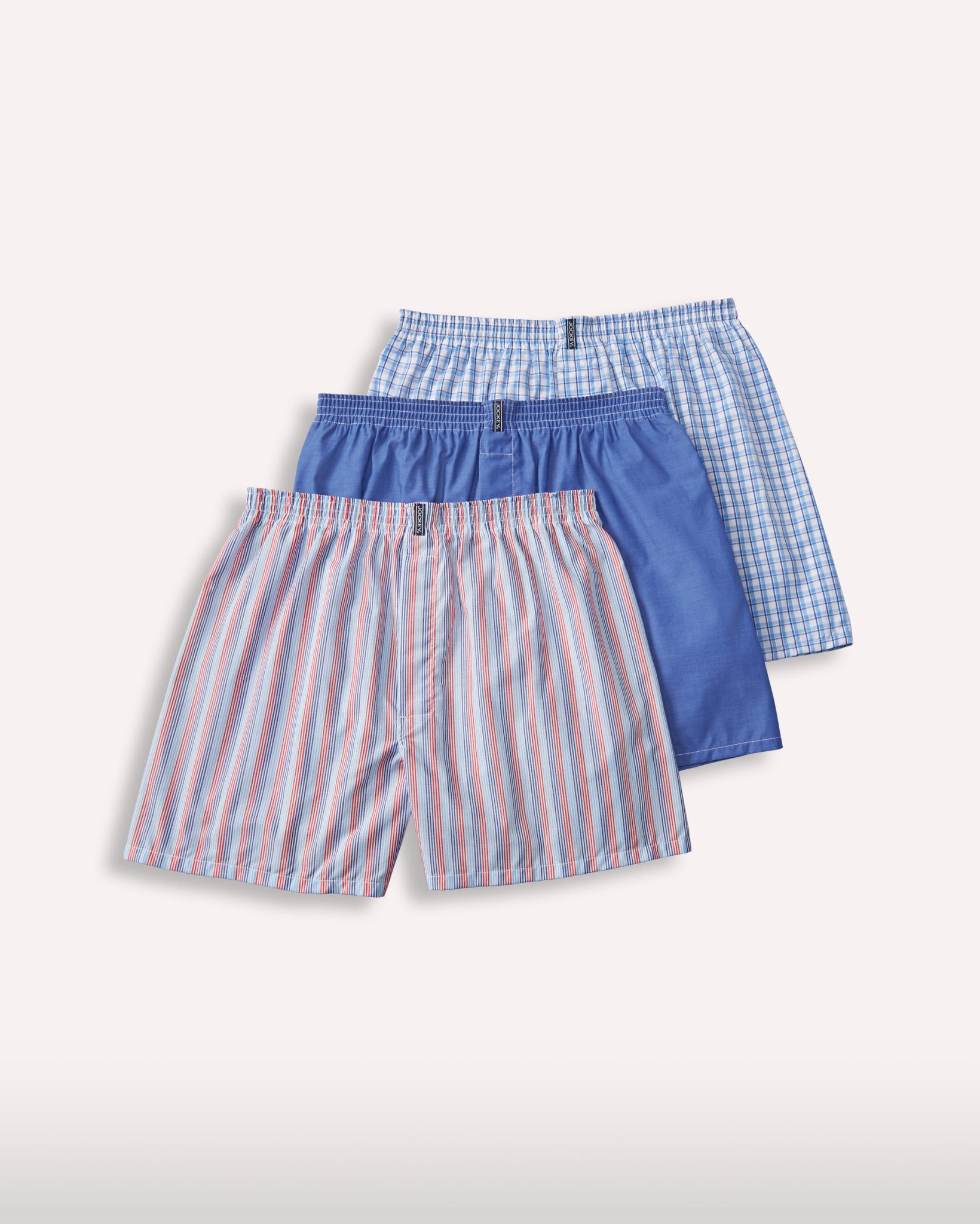 Three-pack flat lay in mixed plaids and solids