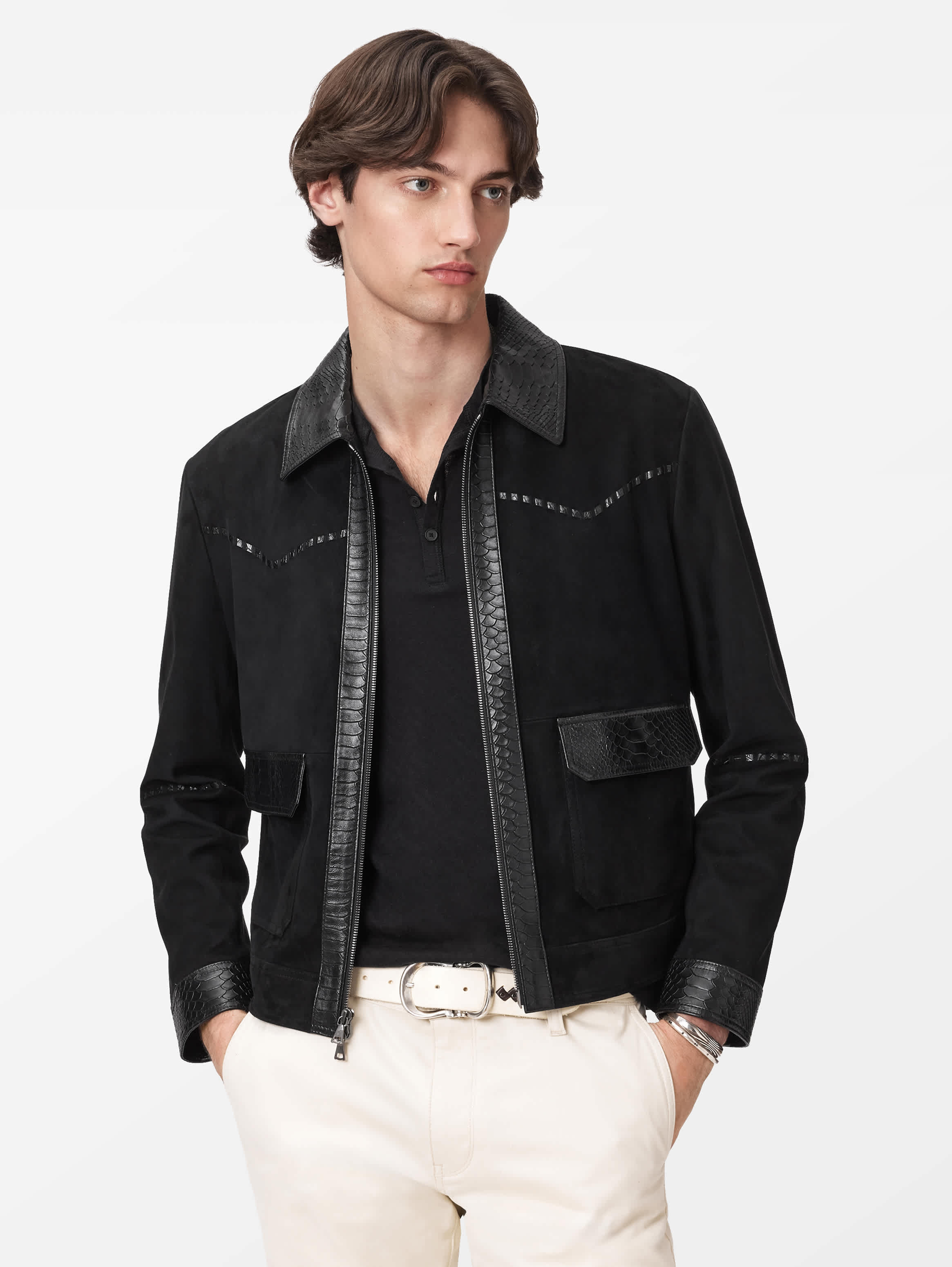 Three-quarter look showing the jacket worn with pale tailoring