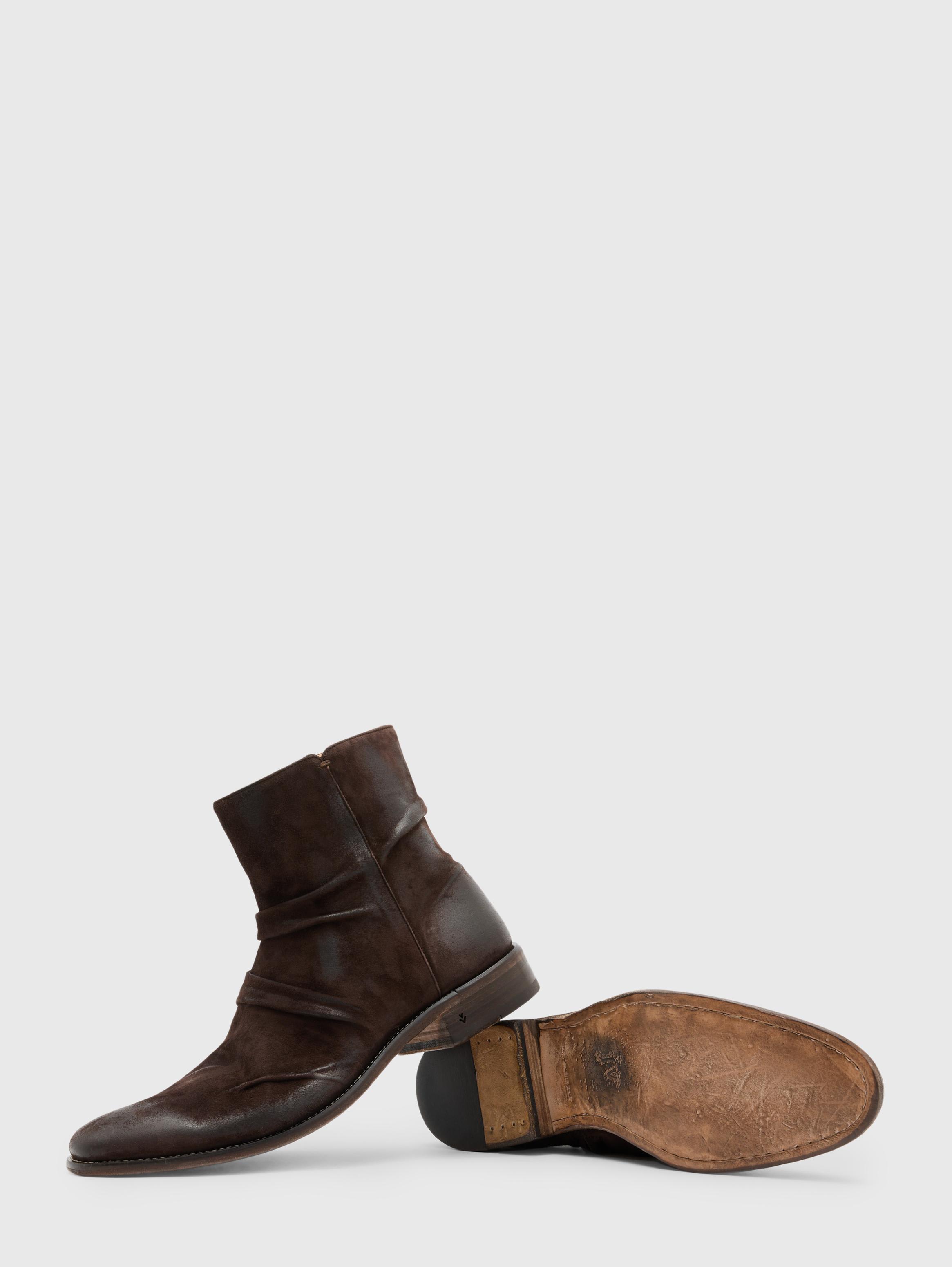 Side and sole view showing the low stacked heel