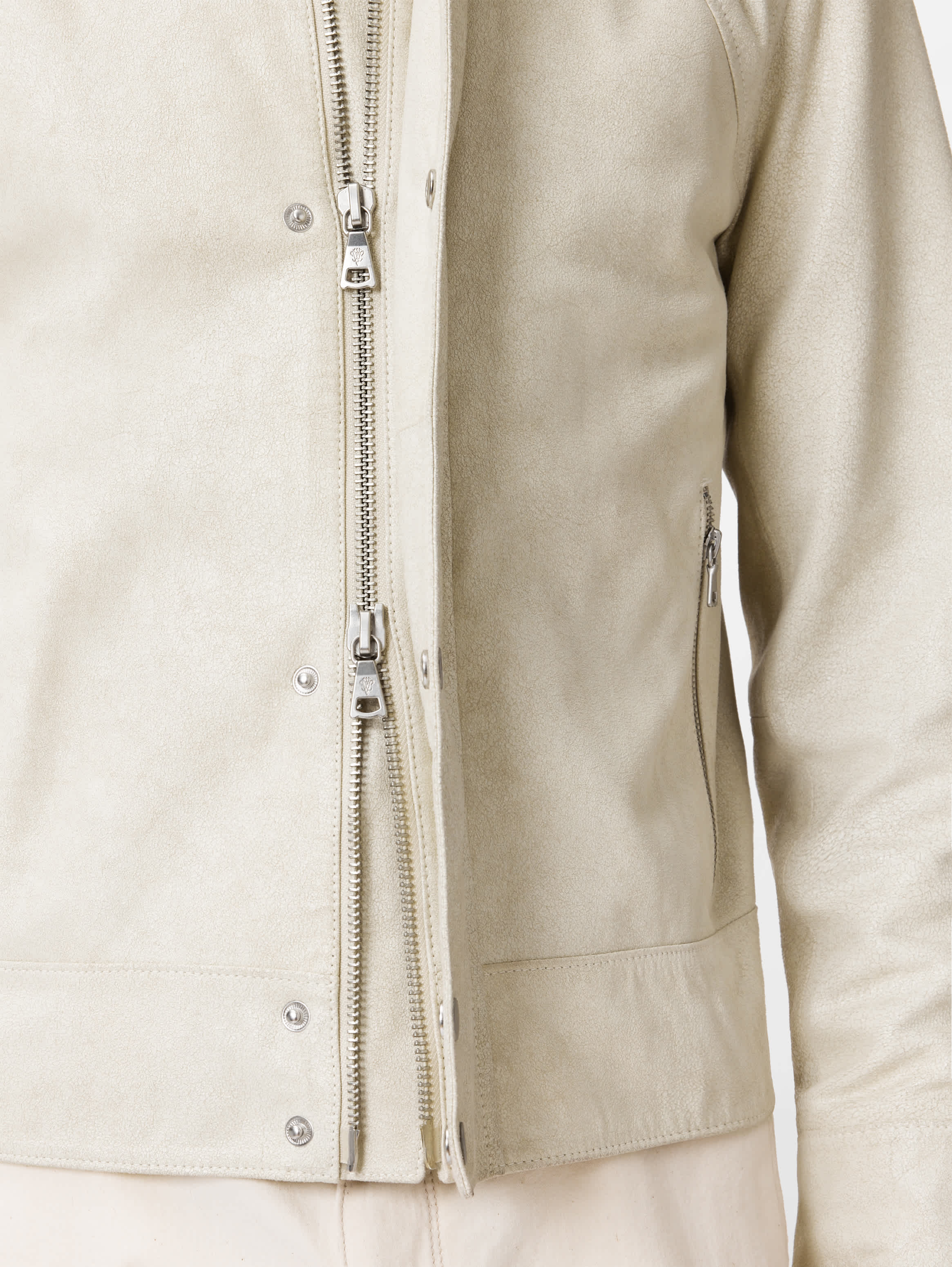 Close crop of the snap-and-zip front hardware