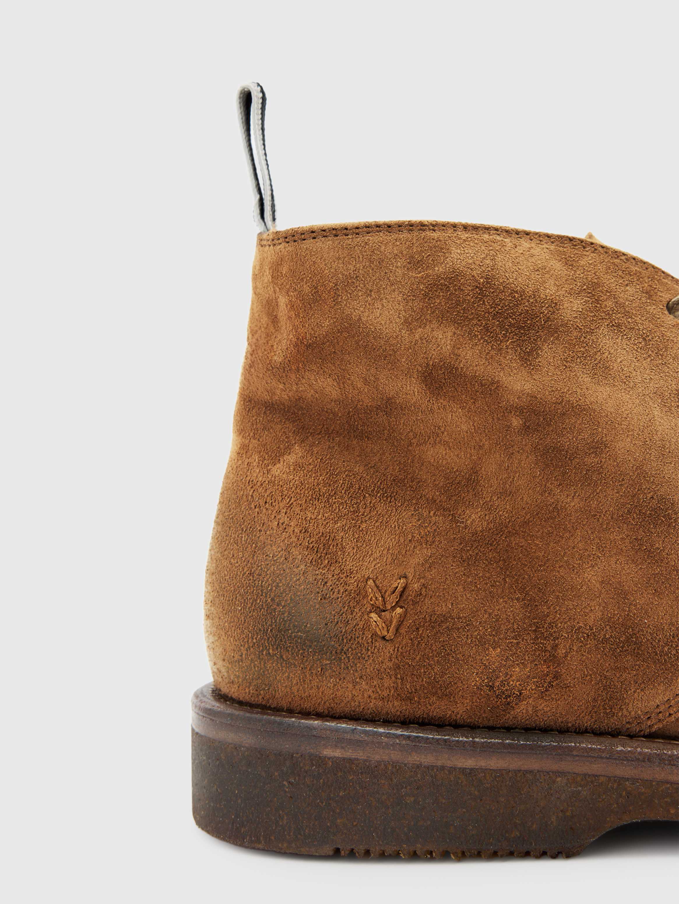 Close crop on the suede texture and heel counter