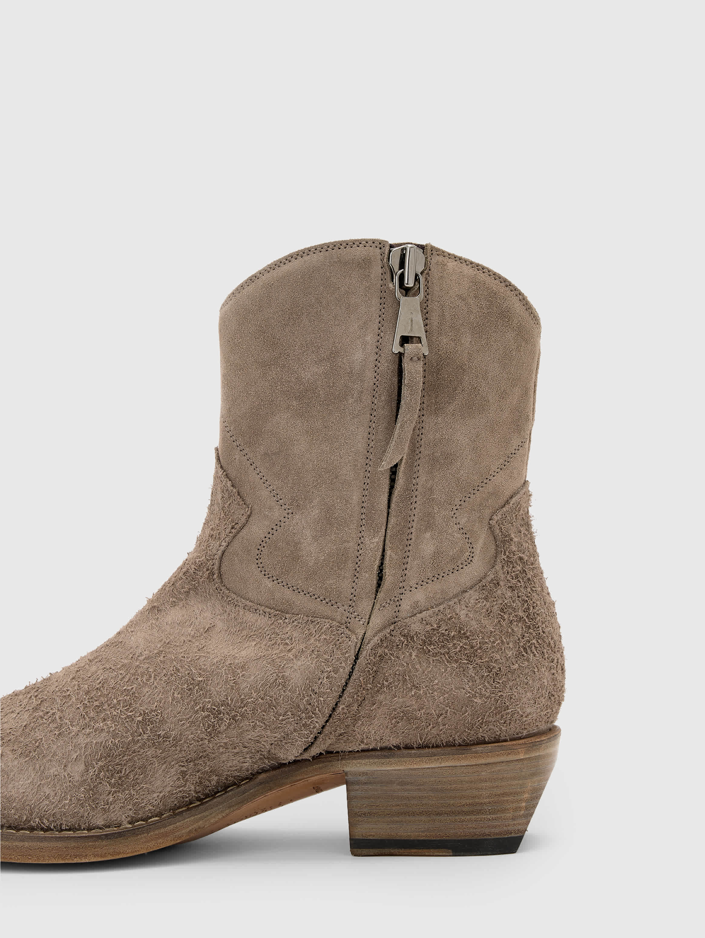 Close crop of the side zip and Western shaft stitching