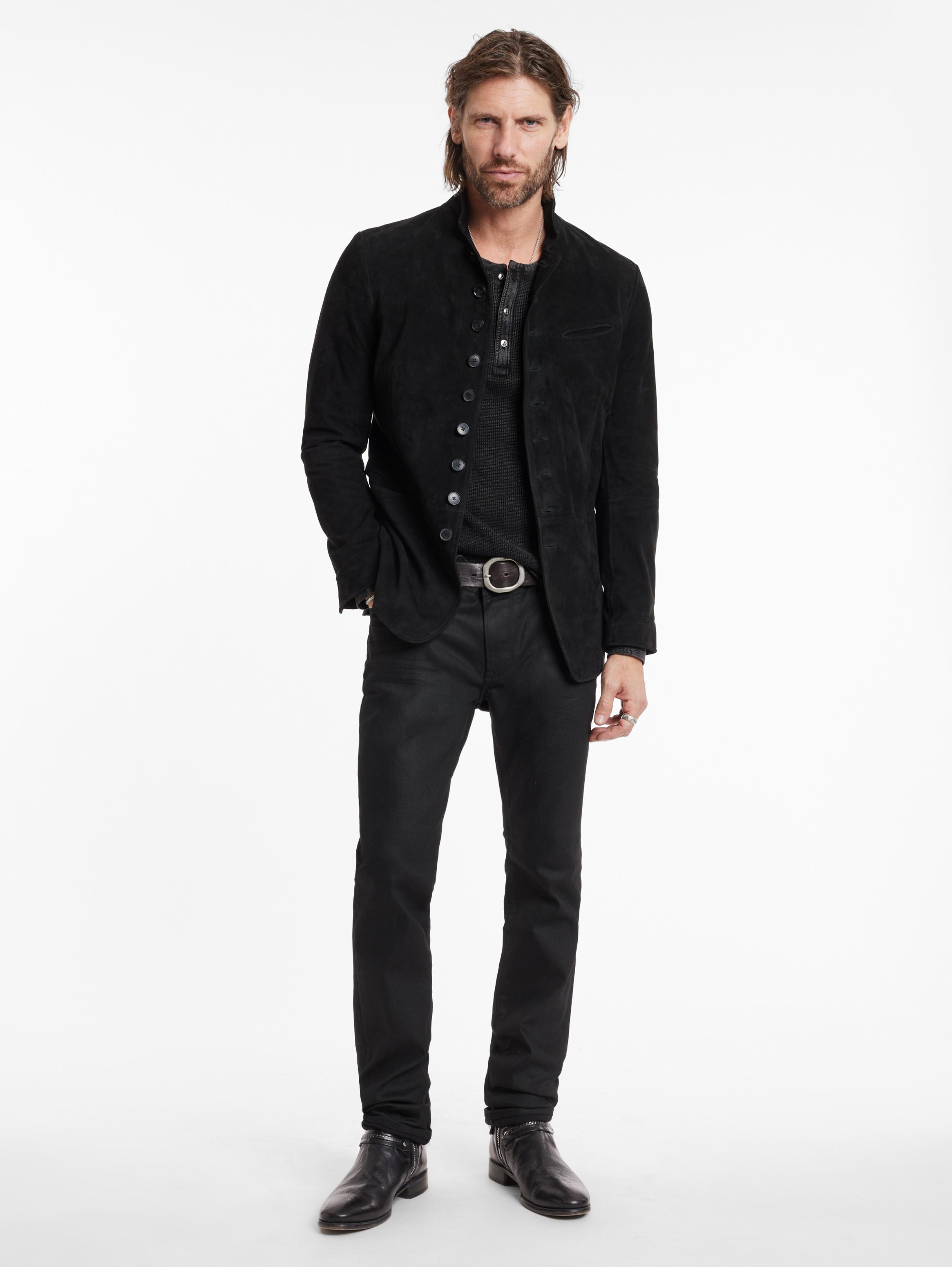 Full-length styling image with slim black denim