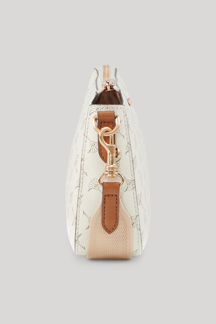 Side profile with the tan trim and zip entry