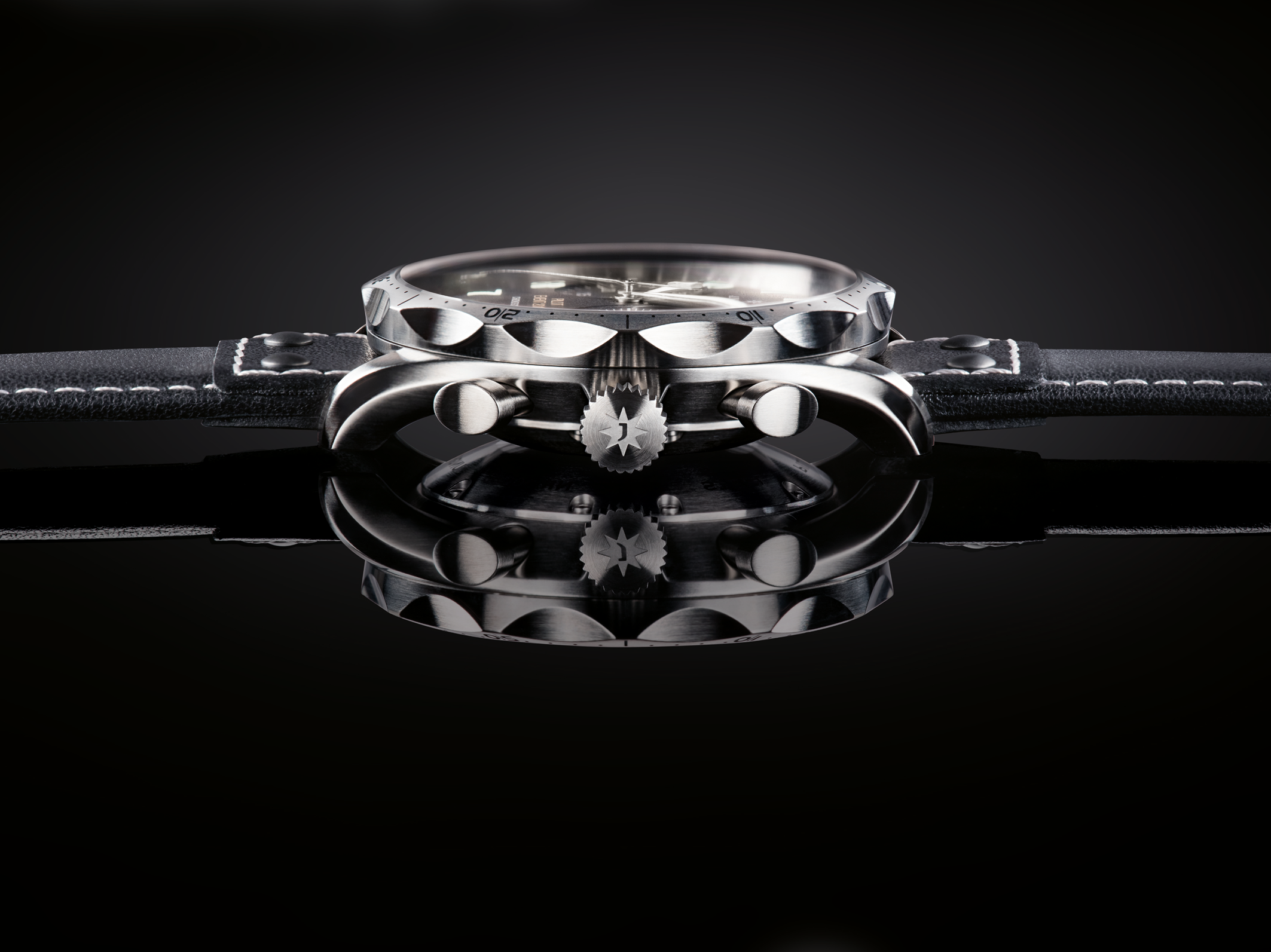 Front view with the lumed numerals and bezel architecture