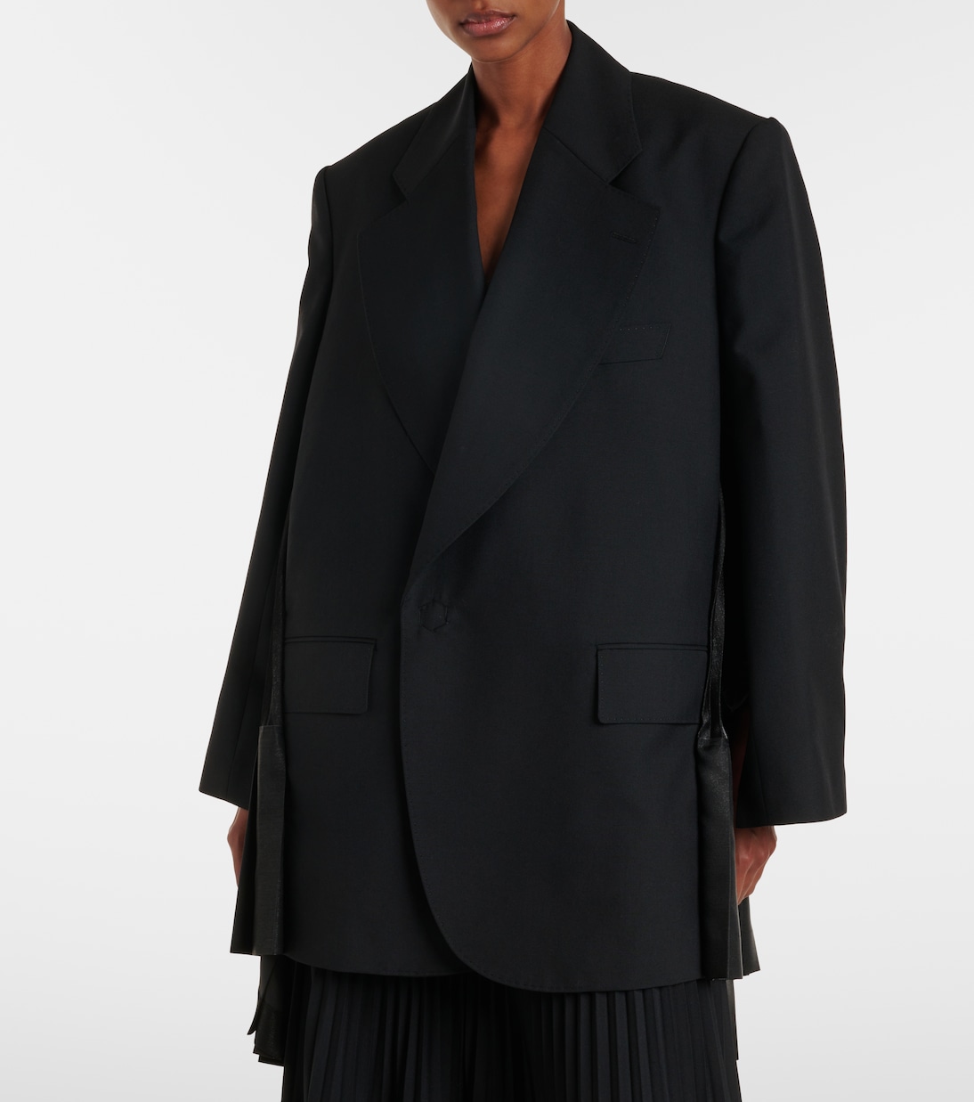 Half-length view emphasizing the dress proportion.