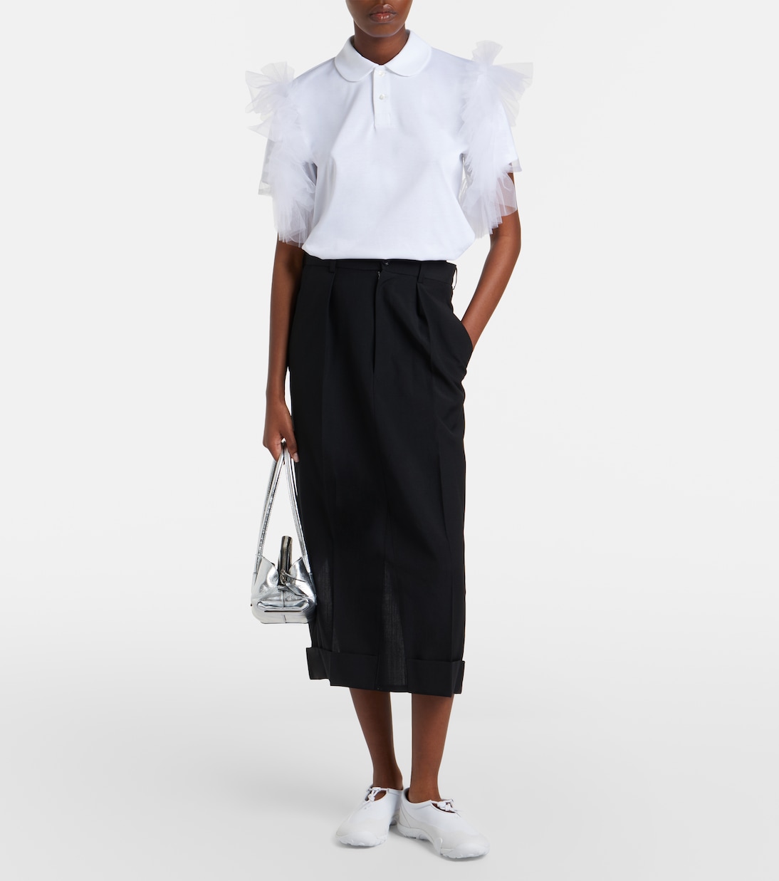 Styled full look emphasizing the shoe’s minimal volume.