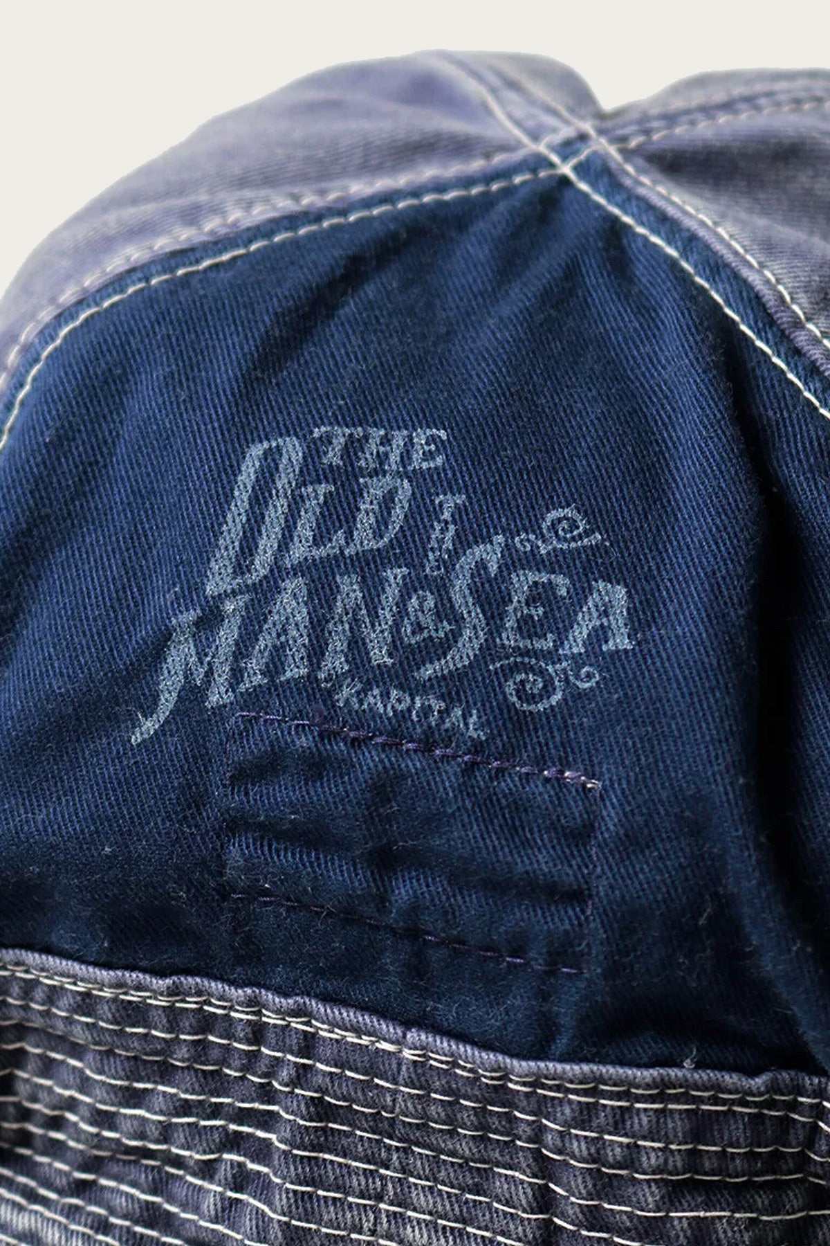Closer view of the stitched damage work