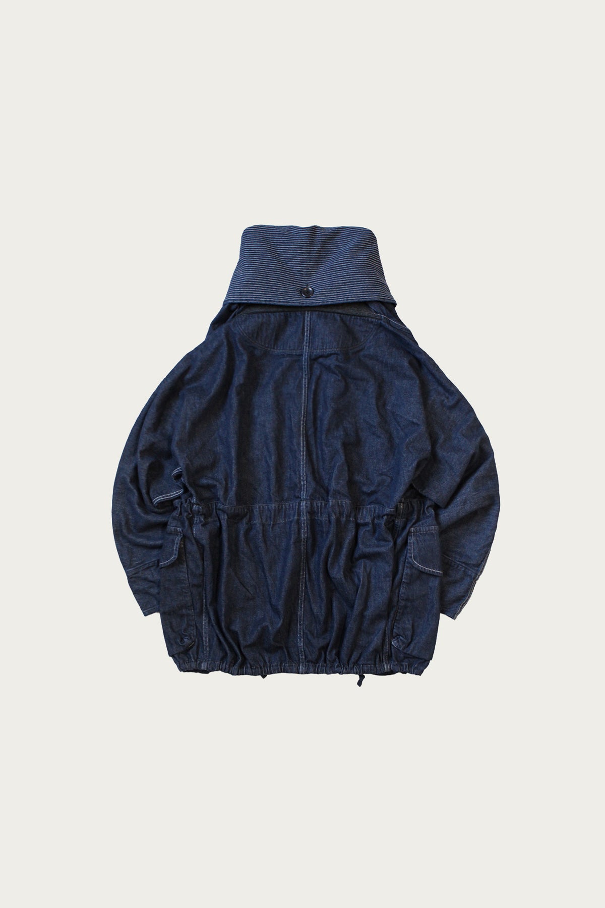 Back view of the broad hood and drape