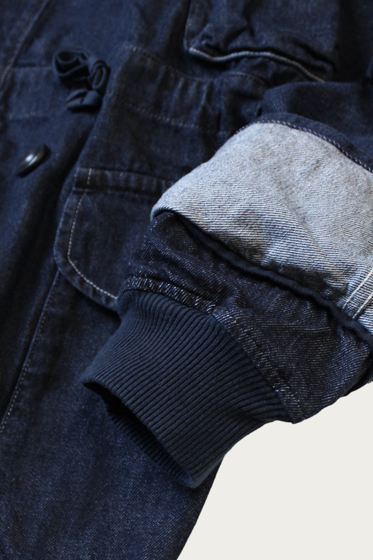 Hem drawcord and layered front closure