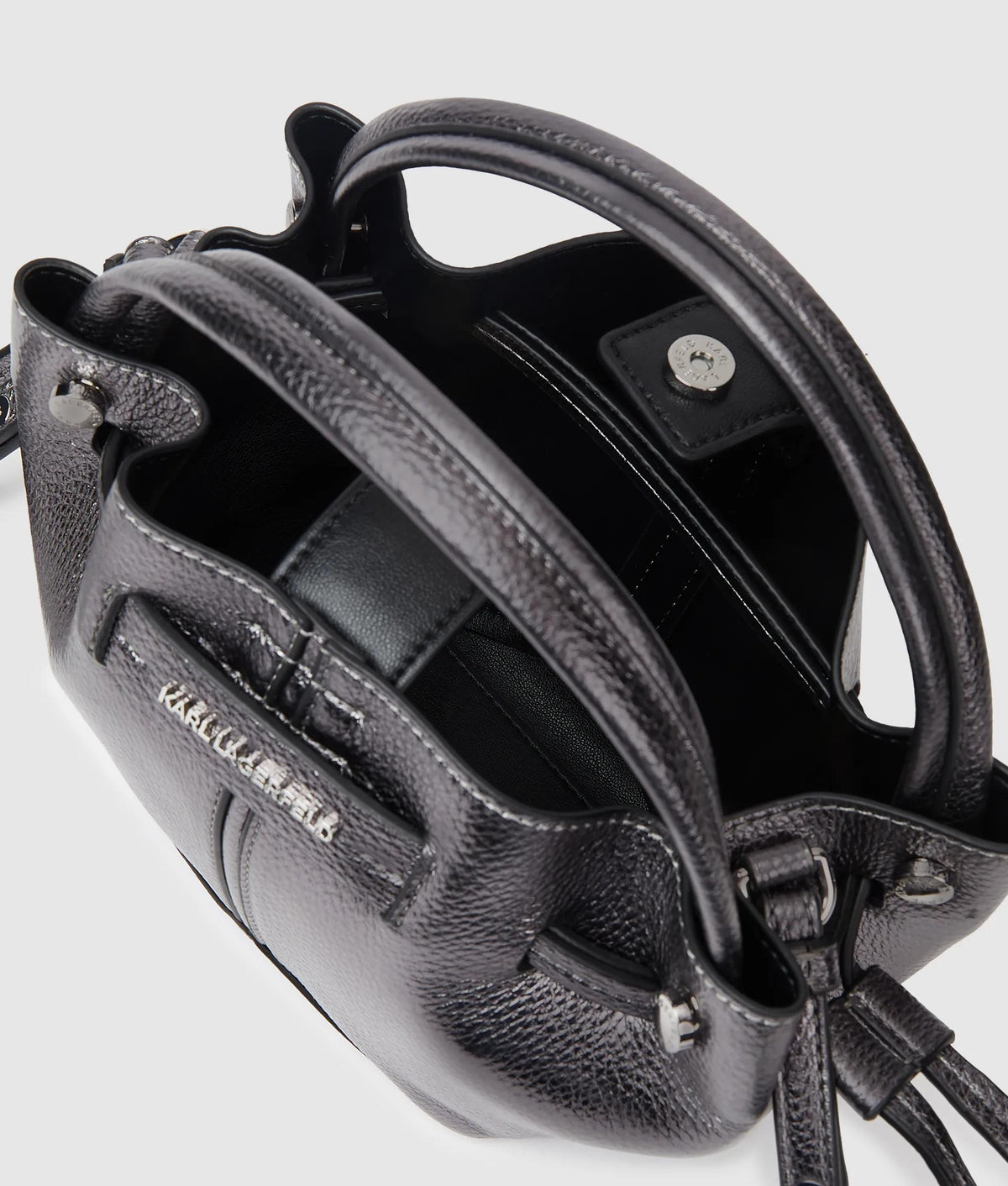 Interior opening and strap attachment