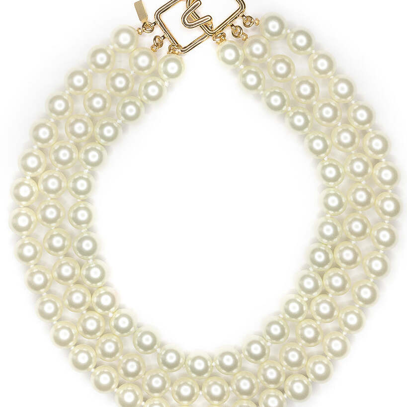 Closer crop on the pearl rows and clasp geometry