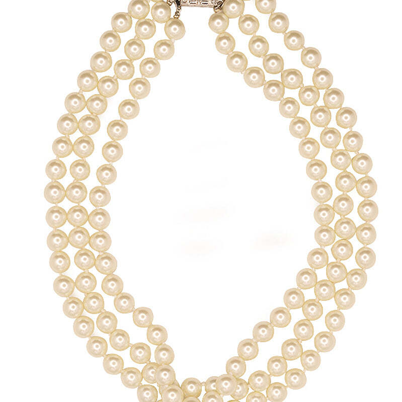 Closer crop on the three graduated rows of glass pearls