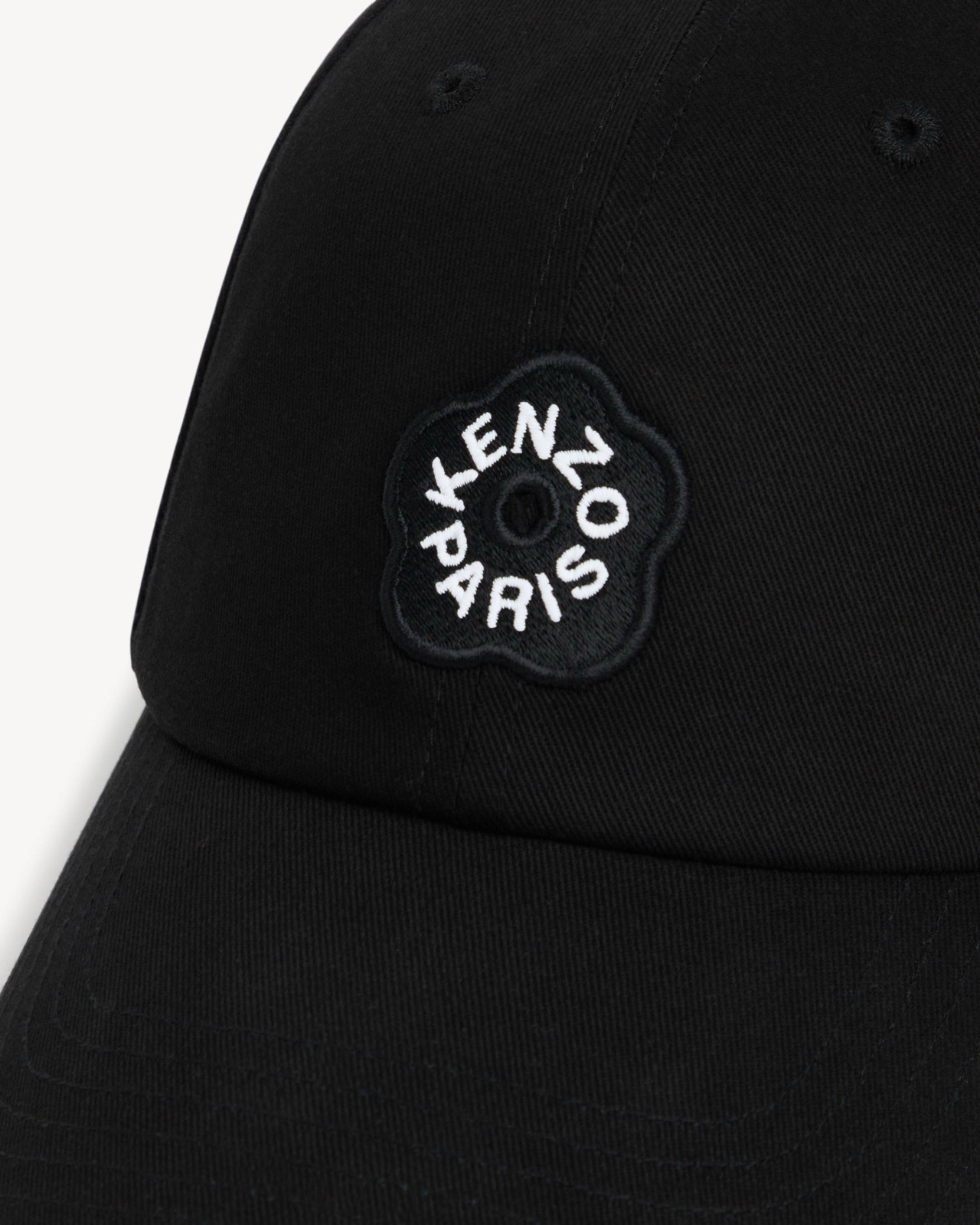 Three-quarter view of the cotton cap