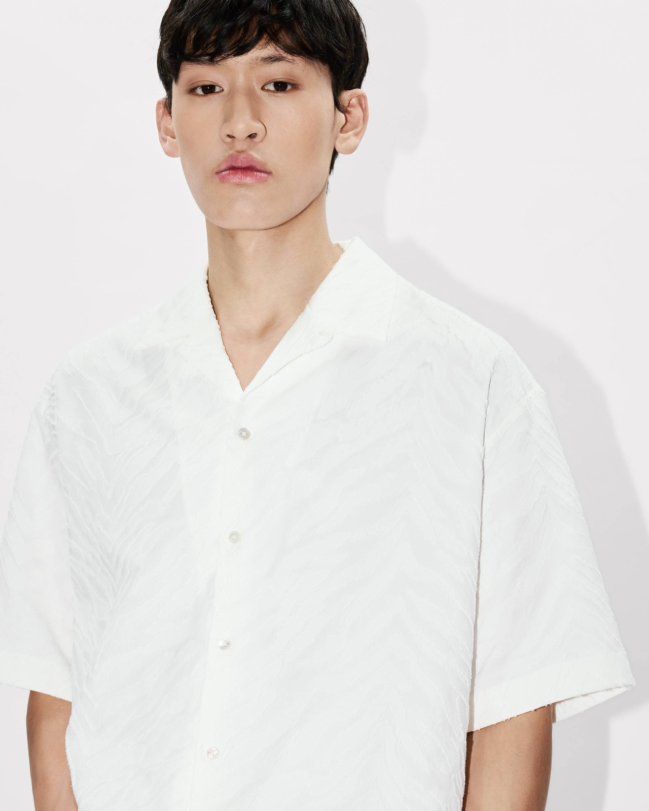 The tonal tiger-stripe jacquard texture, close