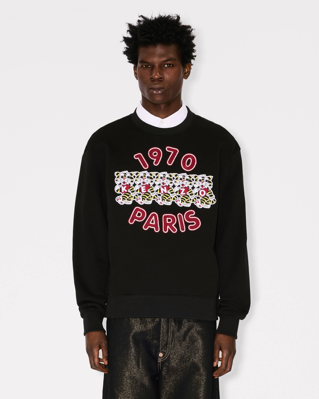 On-body, the tiger row and 1970 Paris arc across the chest